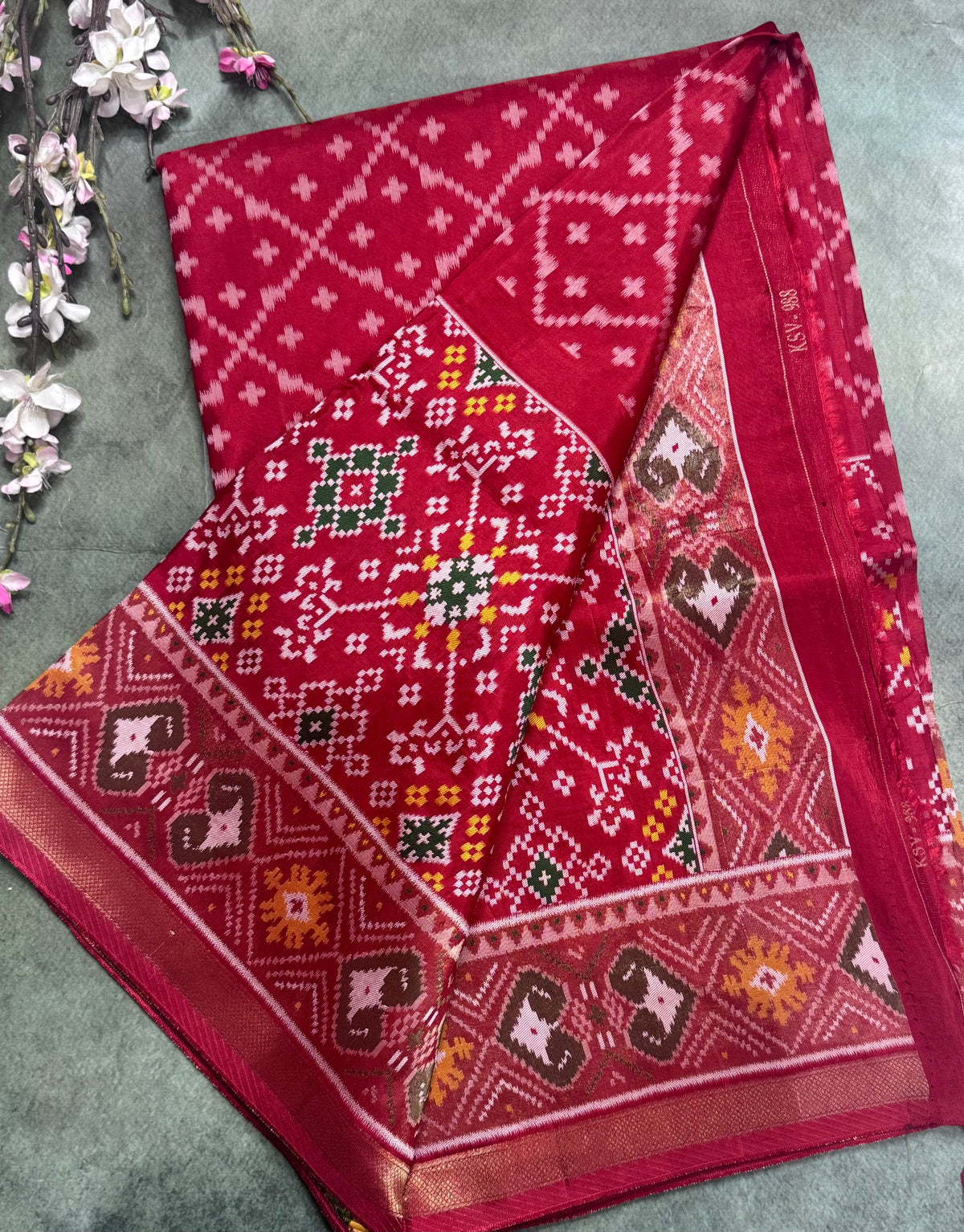 Red small border semi patola saree 111