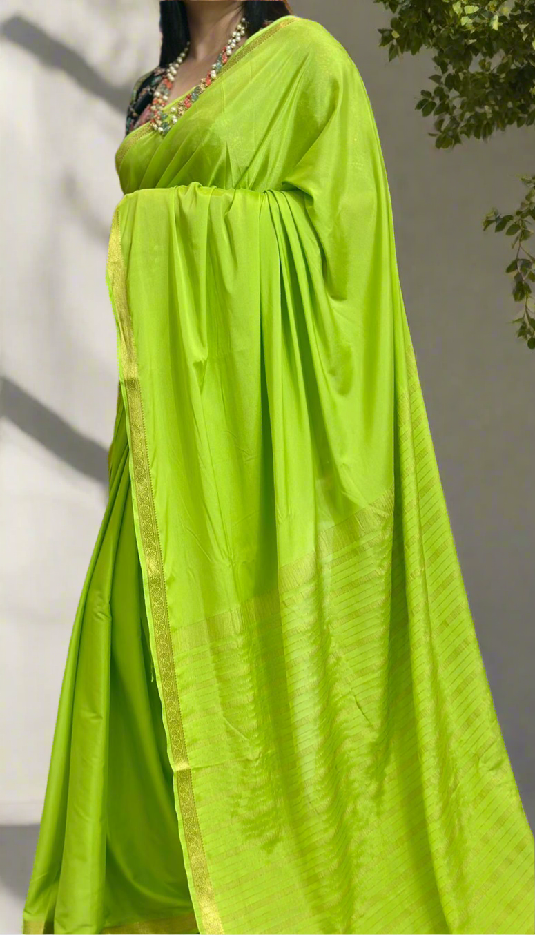Nita ambani Neon green semi mysore crepe plain saree