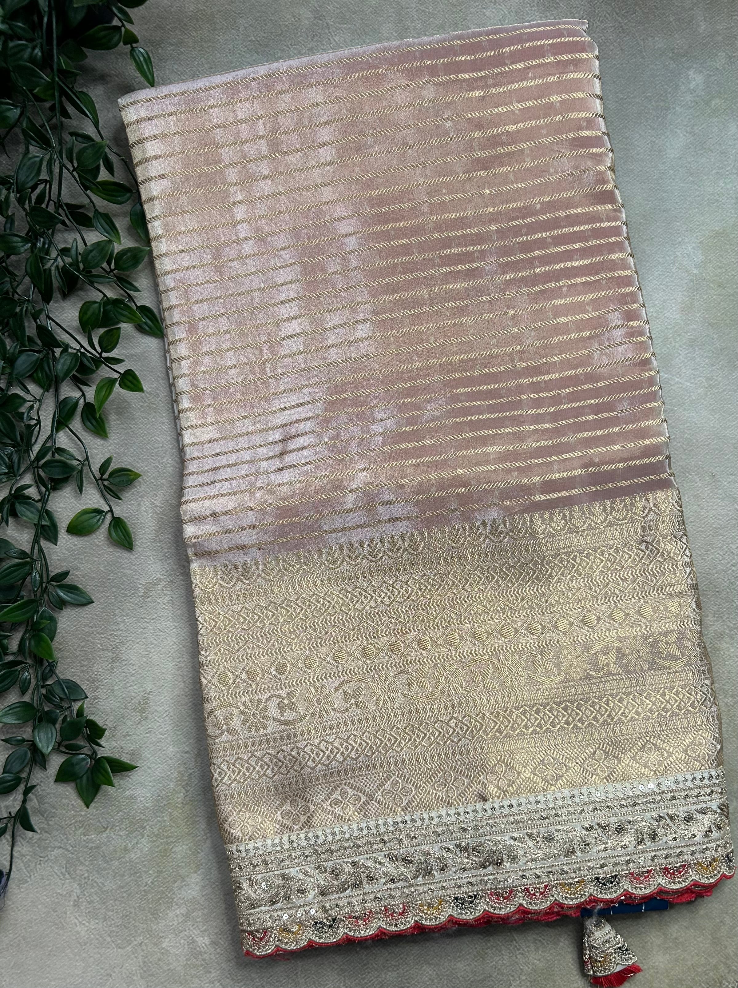 Cream tissue brocade party wear scallop border saree