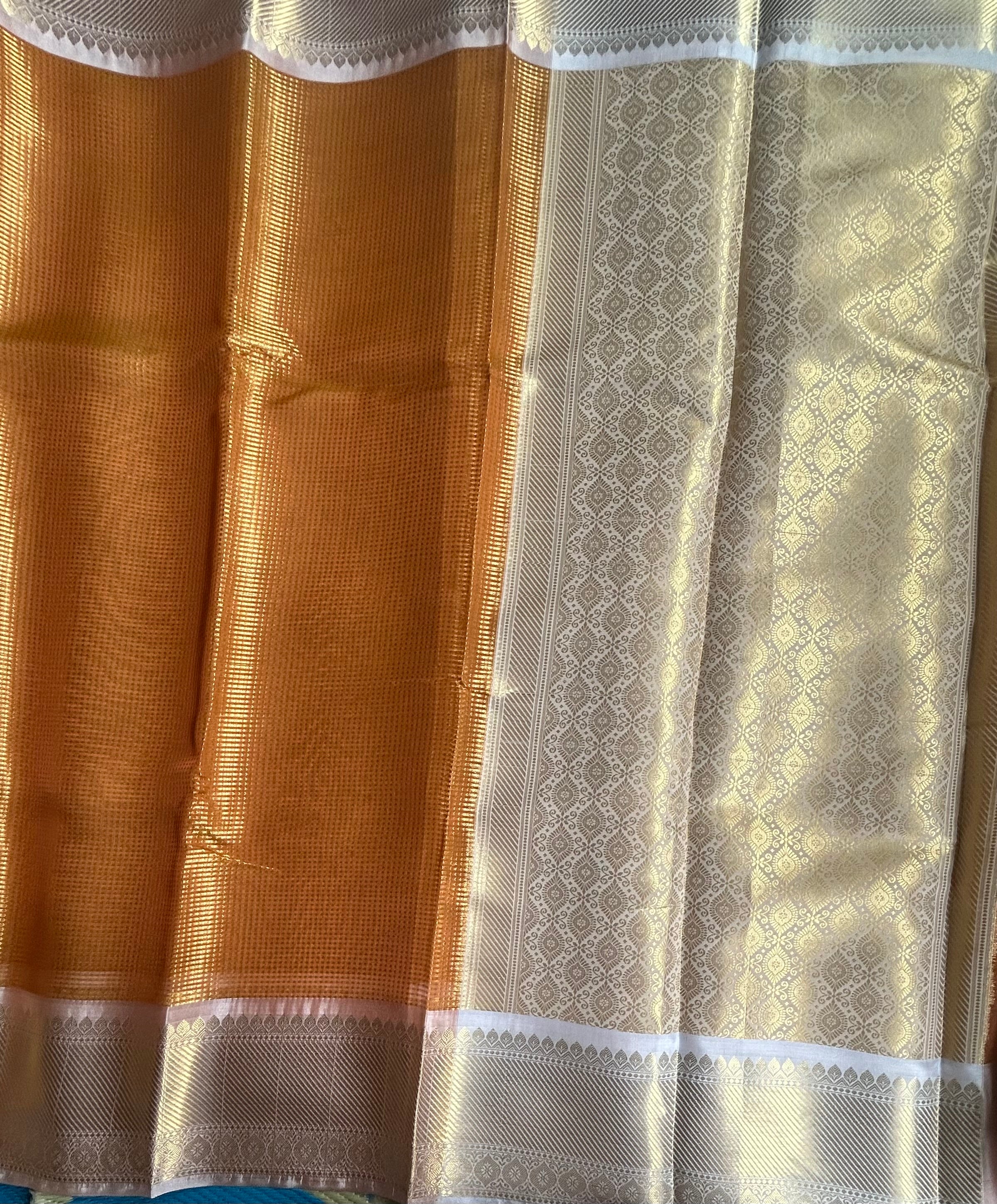 Orange brocade semi tissue saree