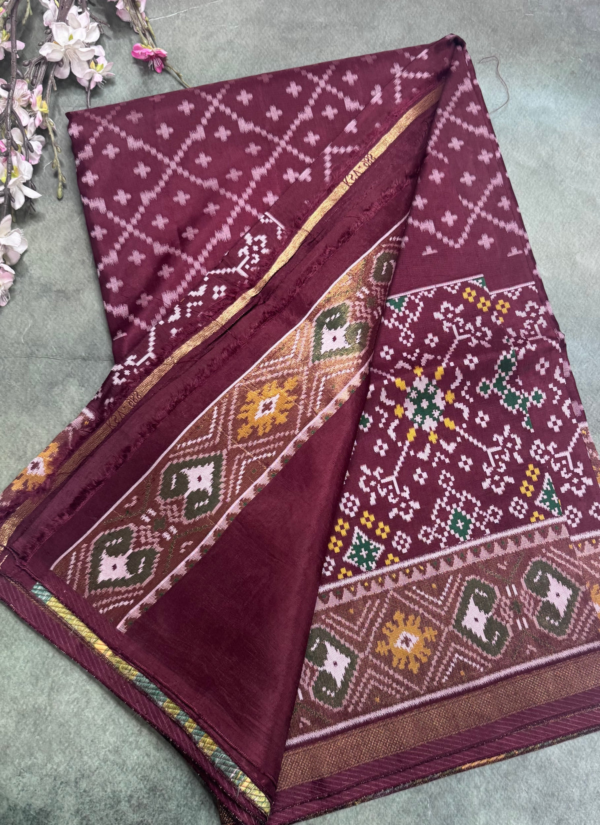 Brown small border semi patola saree 111