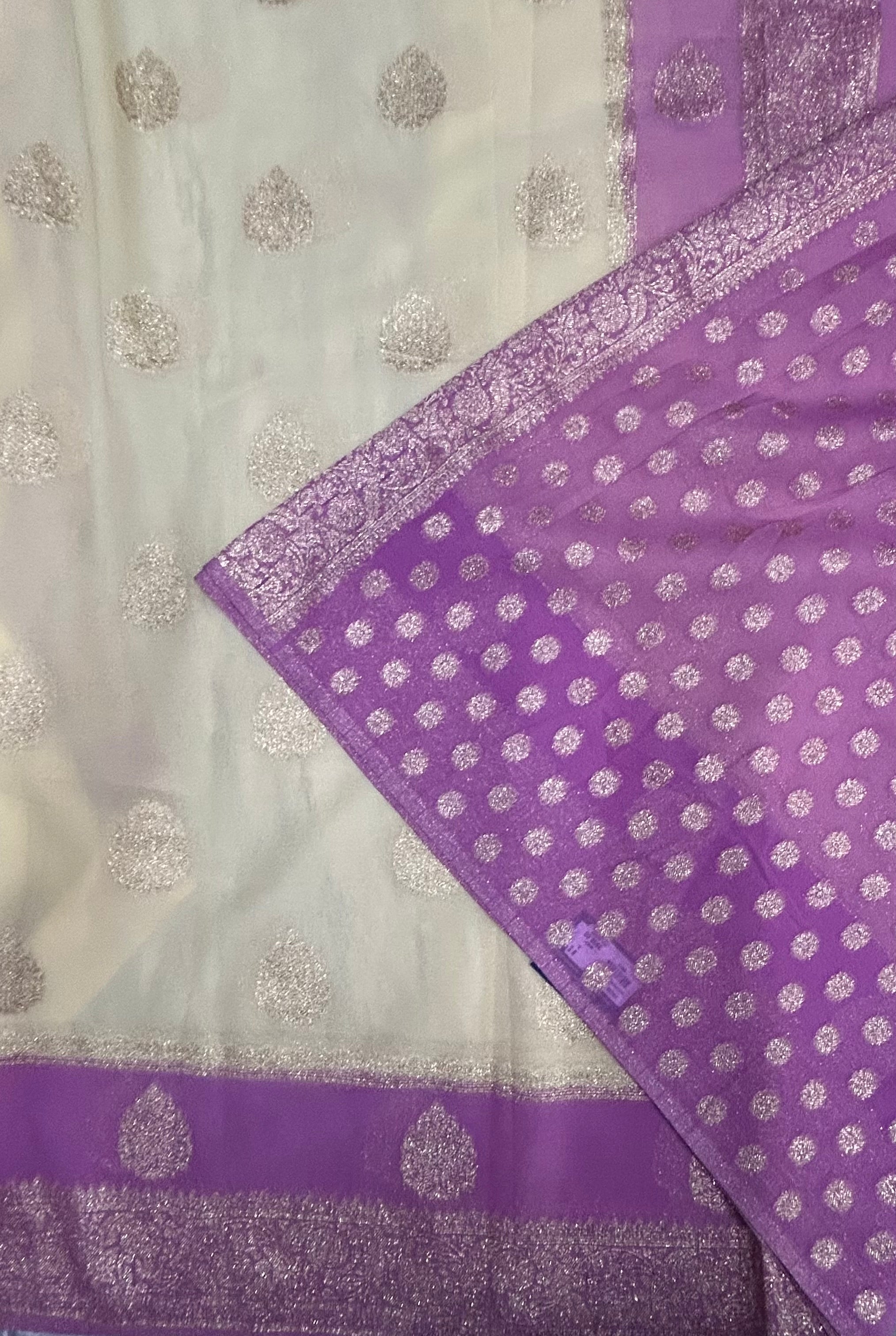 Cream m pink border Butta semi georgette saree