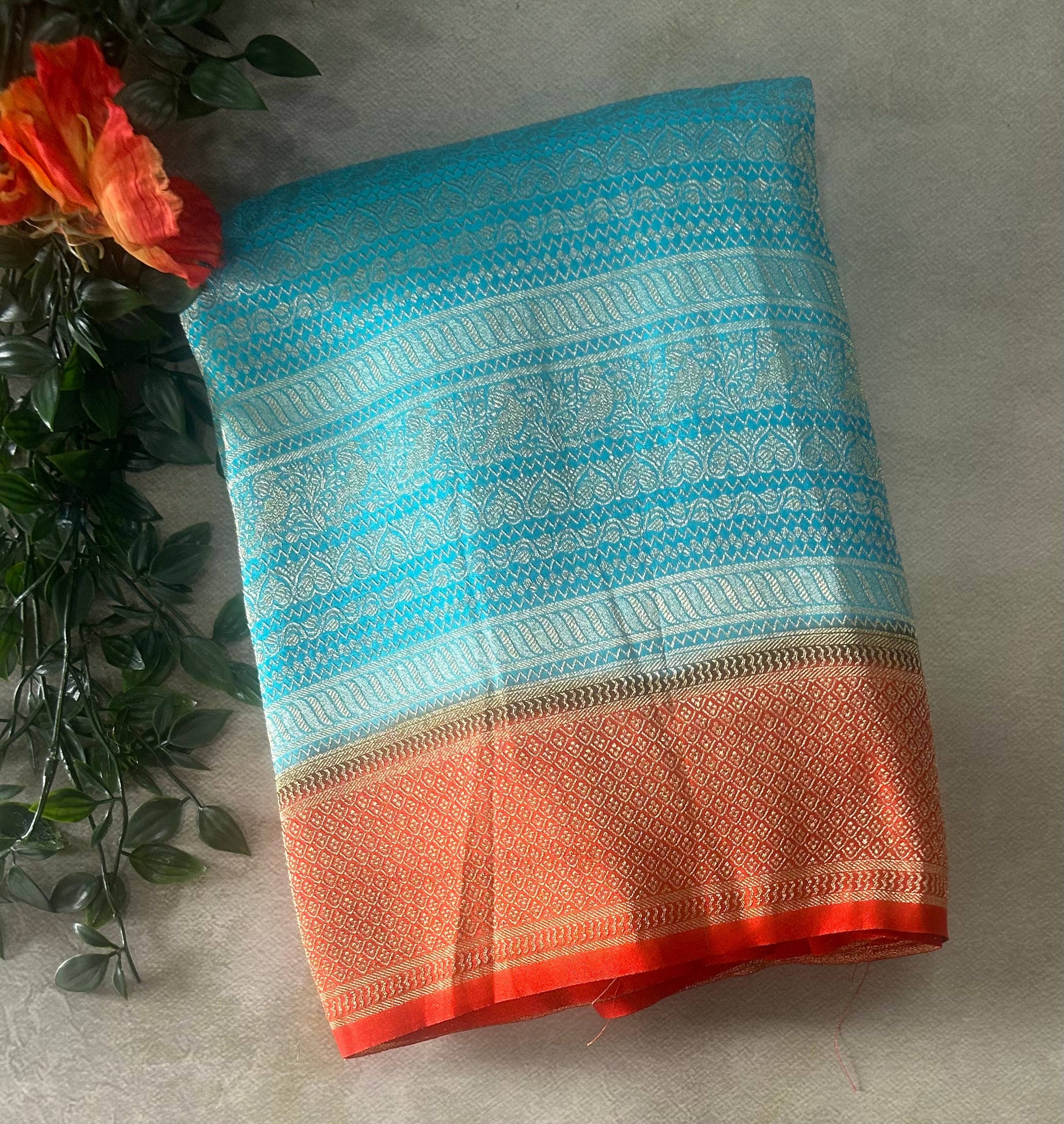 Sky blue brocade semi georgette 105 saree