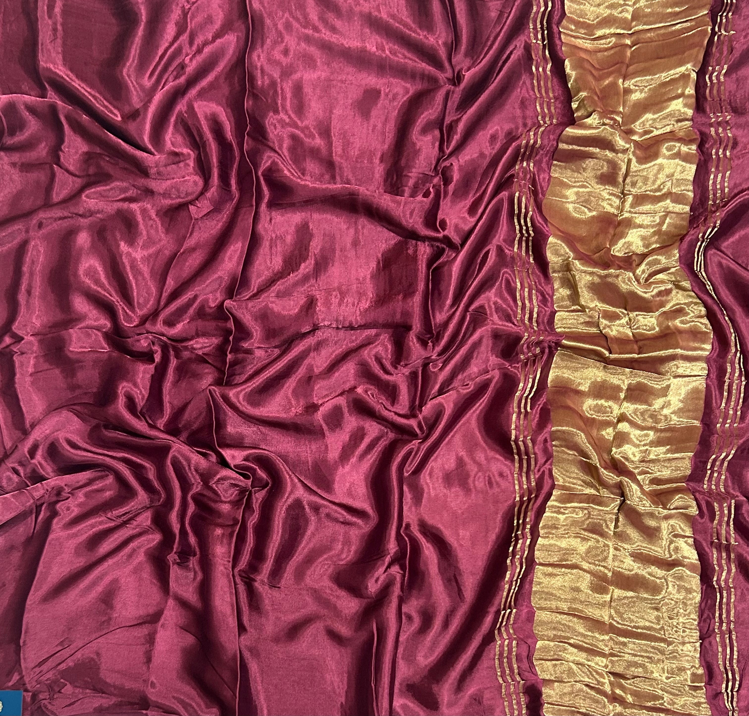 Dark maroon plain borderless modal silk 104 saree