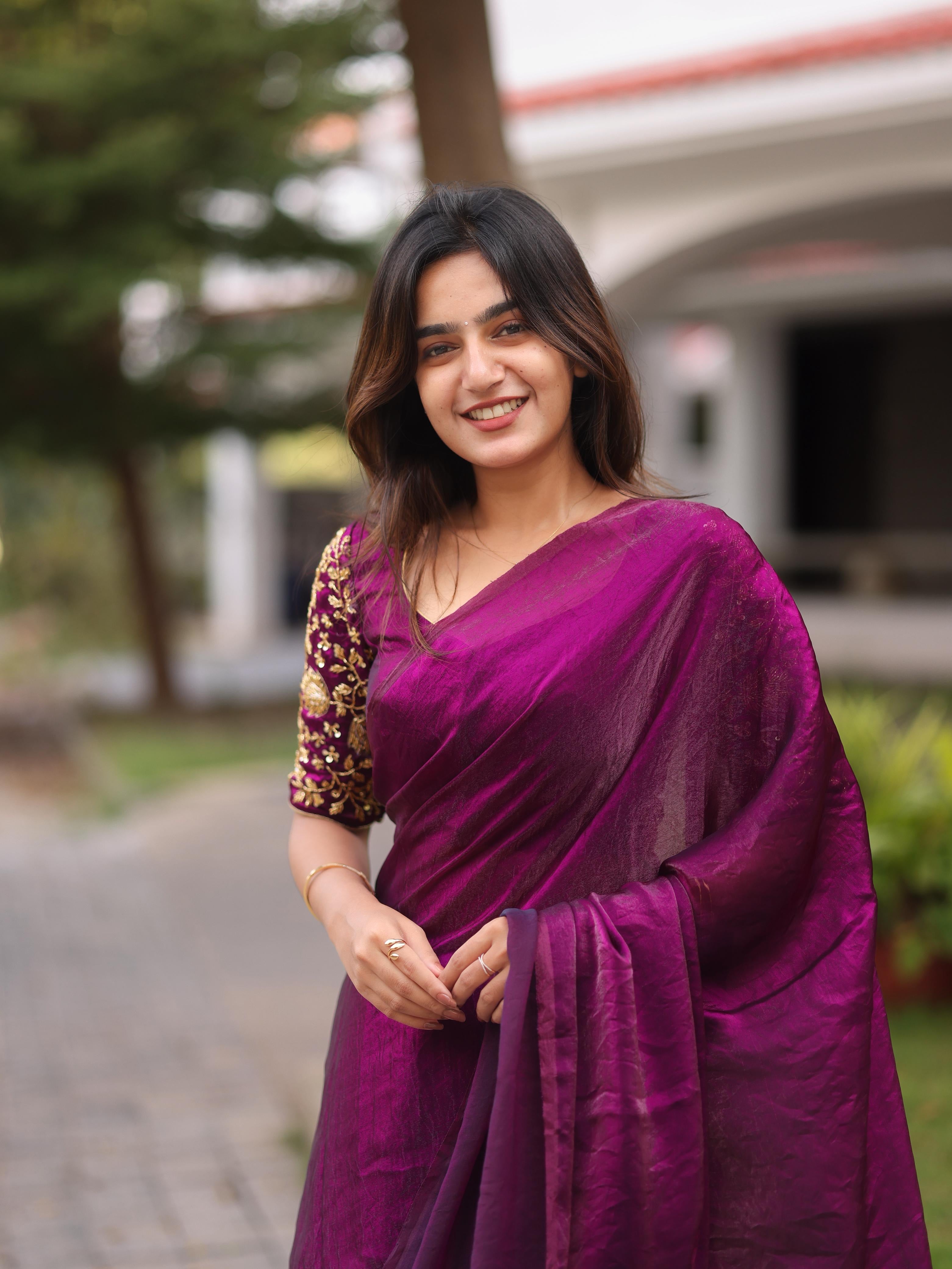 Shiny purple party wear with heavy work blouse saree