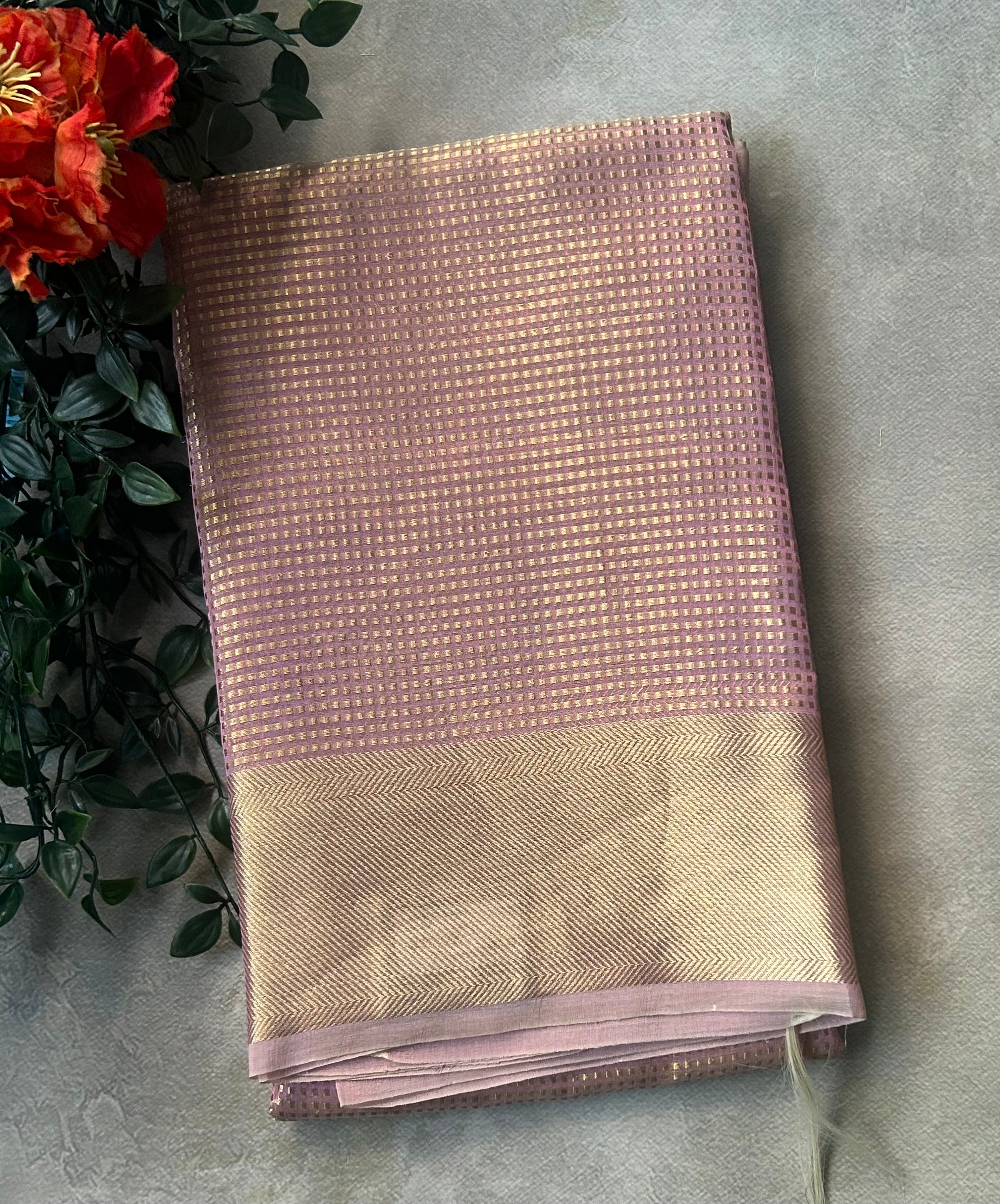 Pastel pink checks brocade semi tissue saree