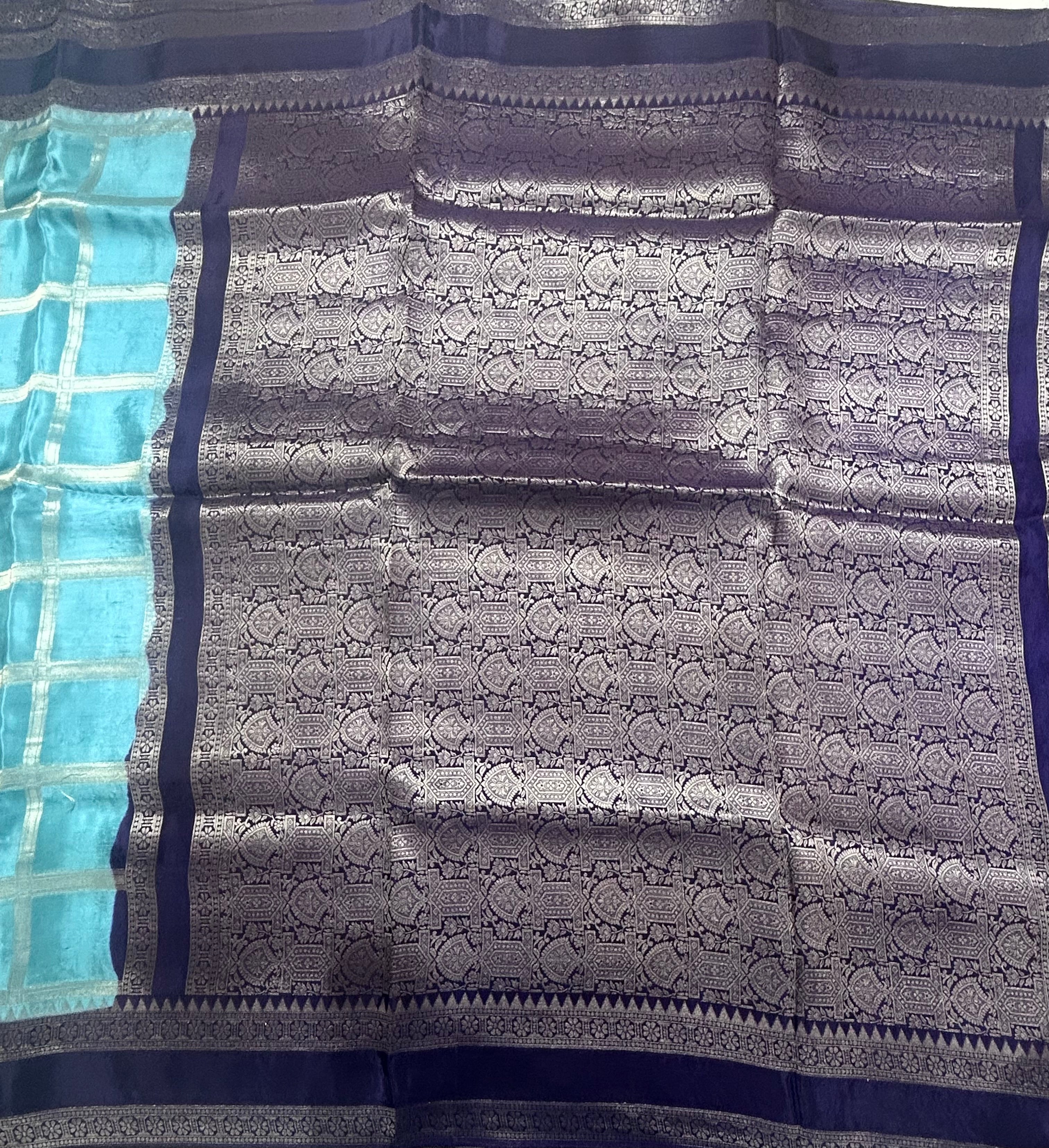 Sea blue checks n bentex border semi crepe 106 saree