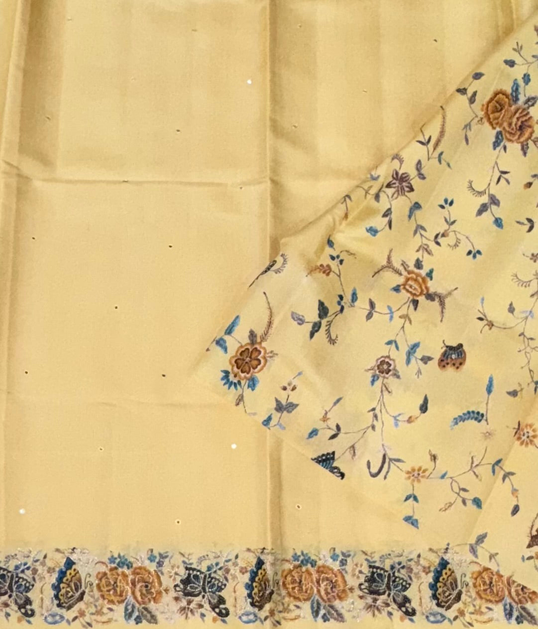 Light yellow printed border tussar saree