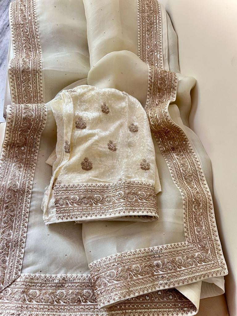 Cream sabyasachi inspired pure organza saree with contrast blouse
