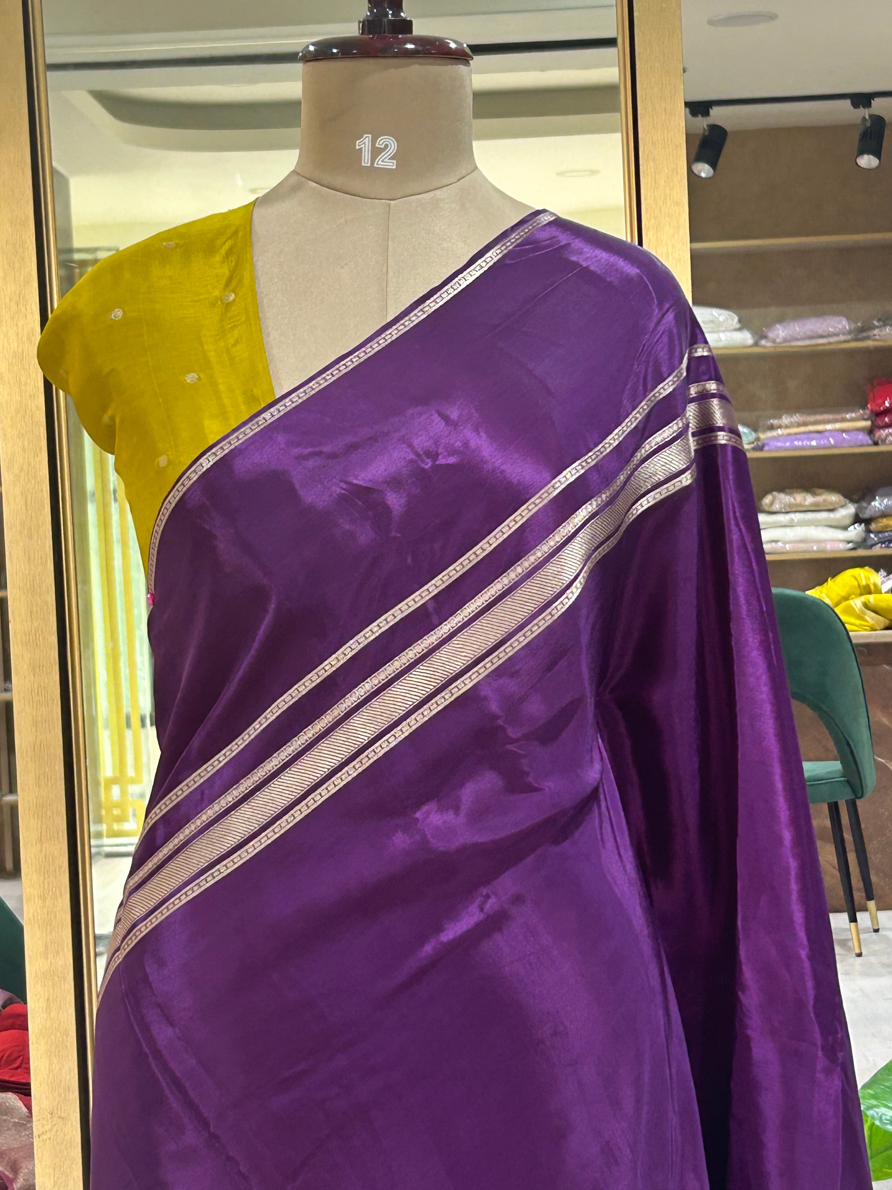 Purple plain four border semi mysore crepe saree