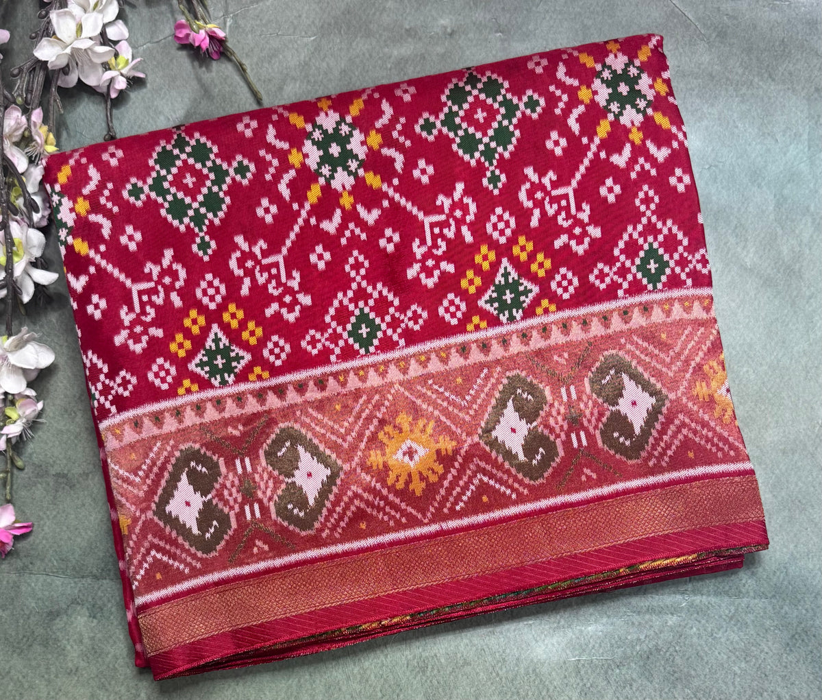 Red small border semi patola saree 111