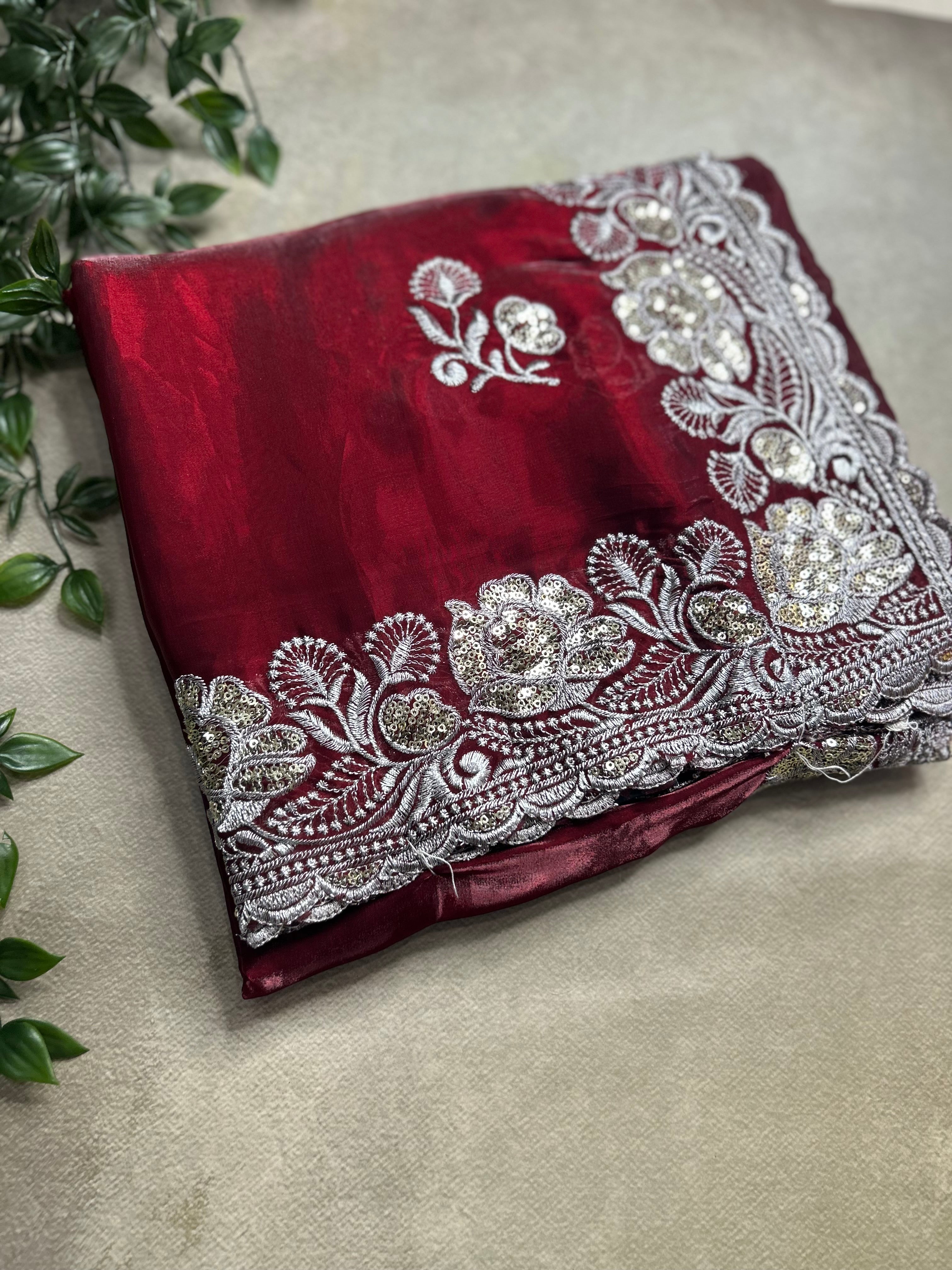 Red embroidery work party wear saree