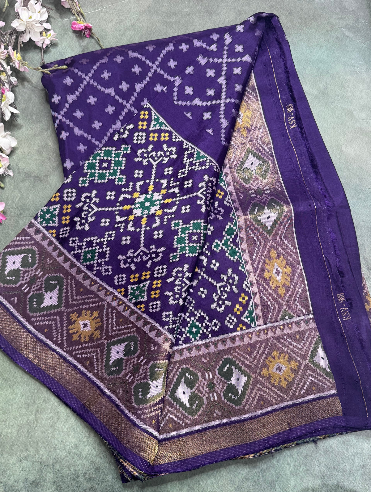 Purple small border semi patola saree 111