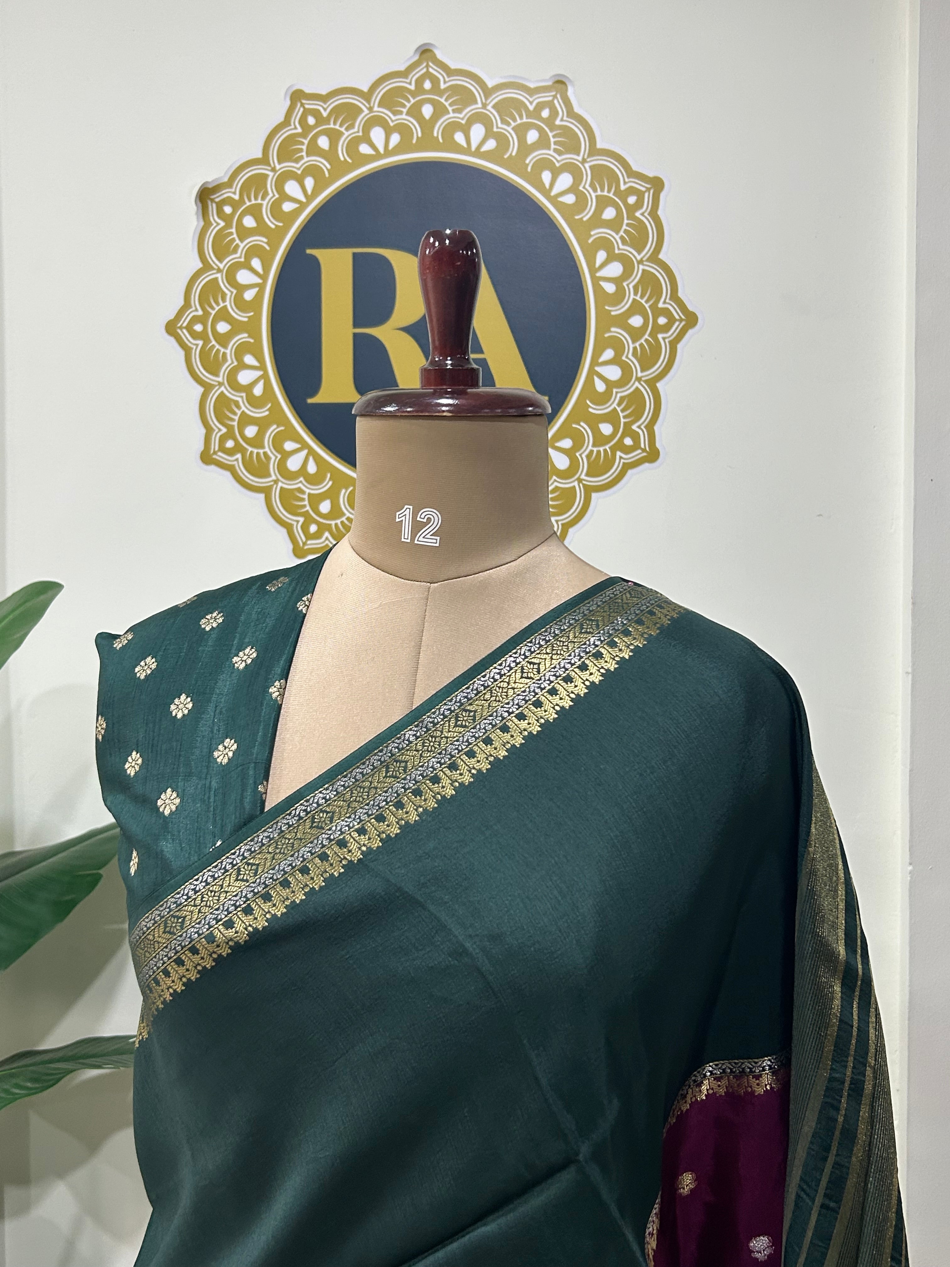 Bottle green n purple premium semi mysore-12 crepe saree