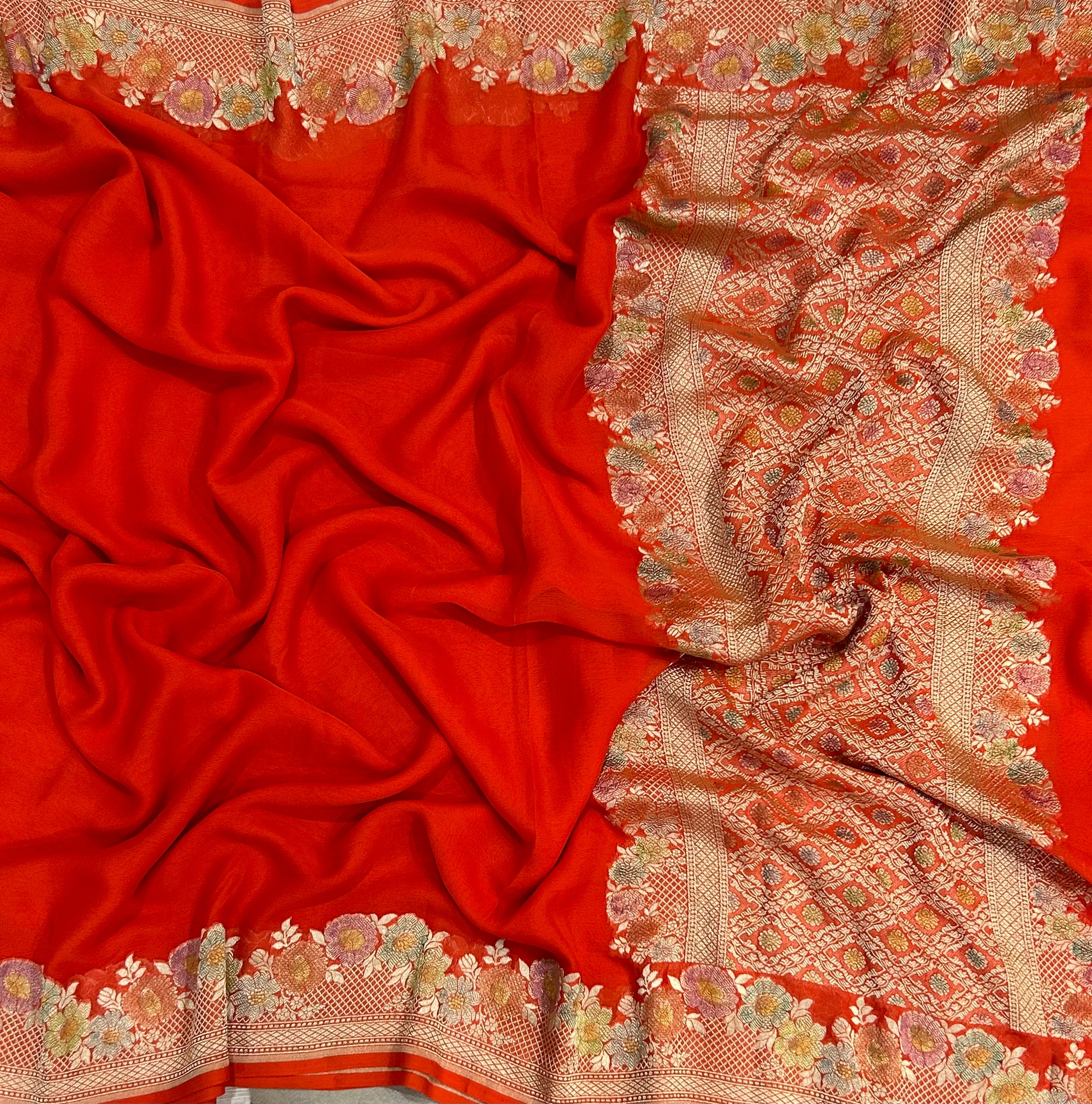 Orange 105 Meena work border pure georgette saree