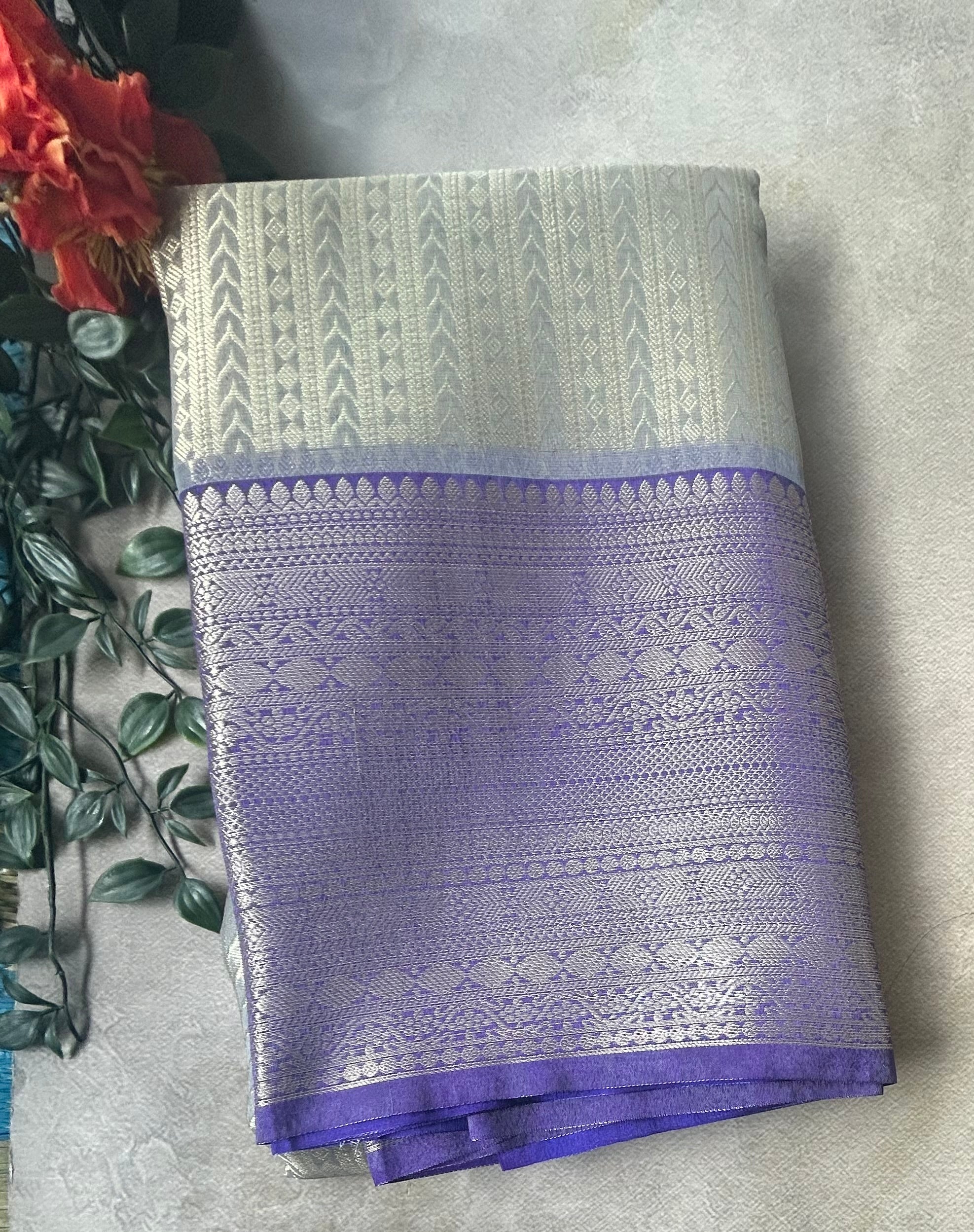Pastel blue contrast border semi tissue saree