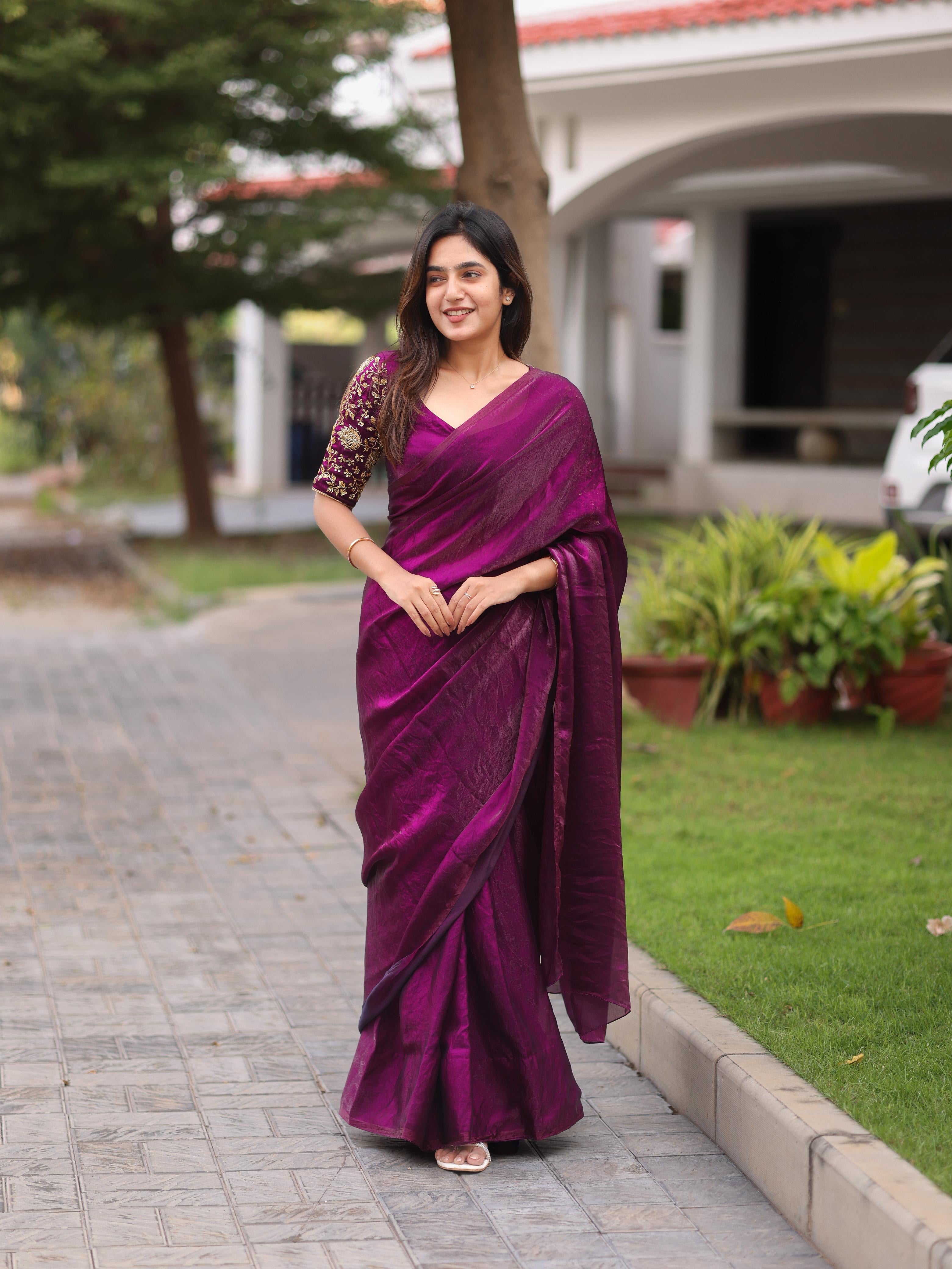 Shiny purple party wear with heavy work blouse saree