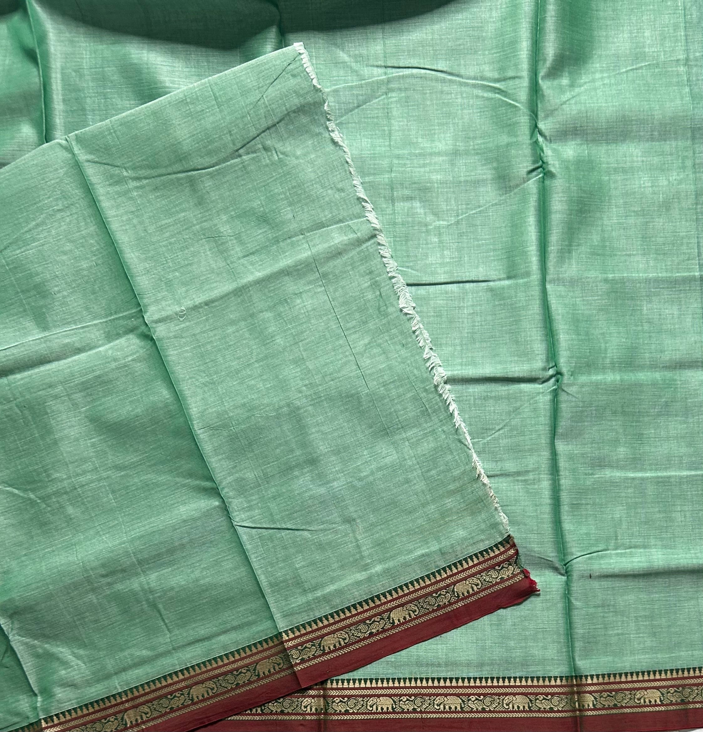 Pastel green Kanchi border pure cotton 103 saree