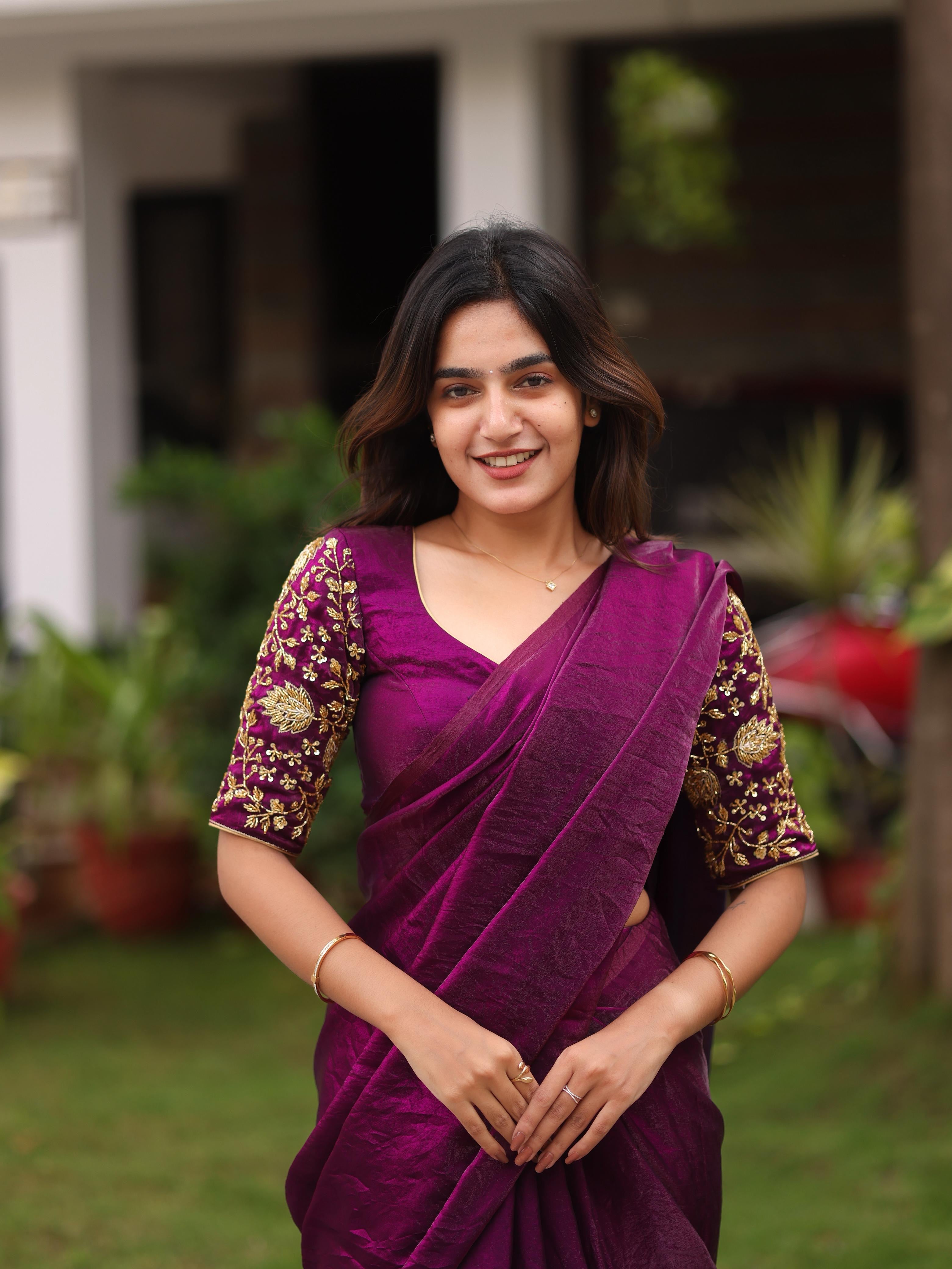 Shiny purple party wear with heavy work blouse saree