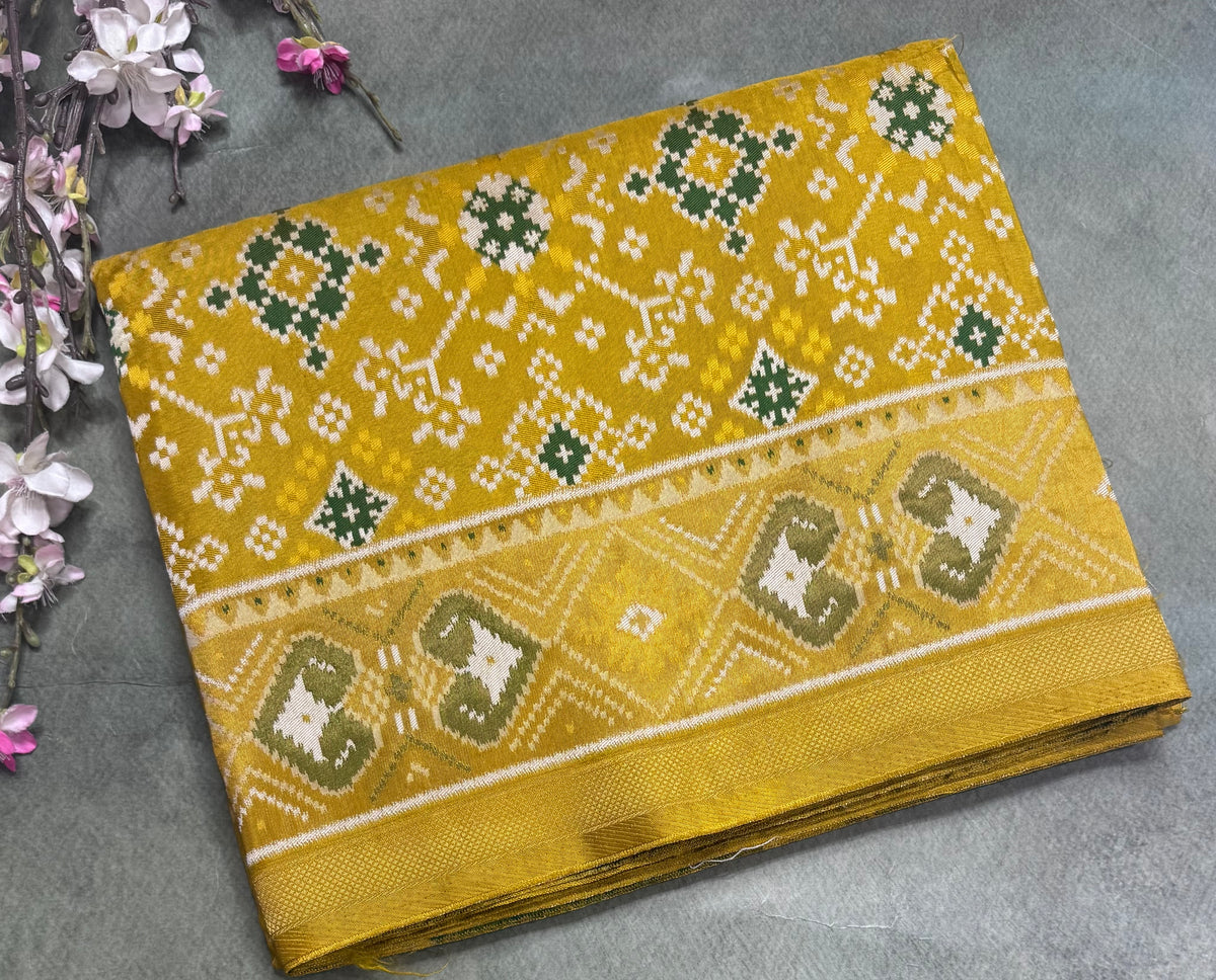 Mustard yellow small border semi patola saree 111