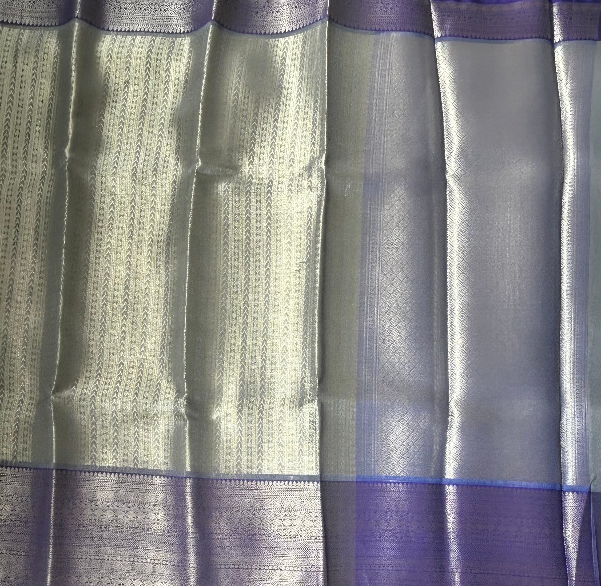 Pastel blue contrast border semi tissue saree