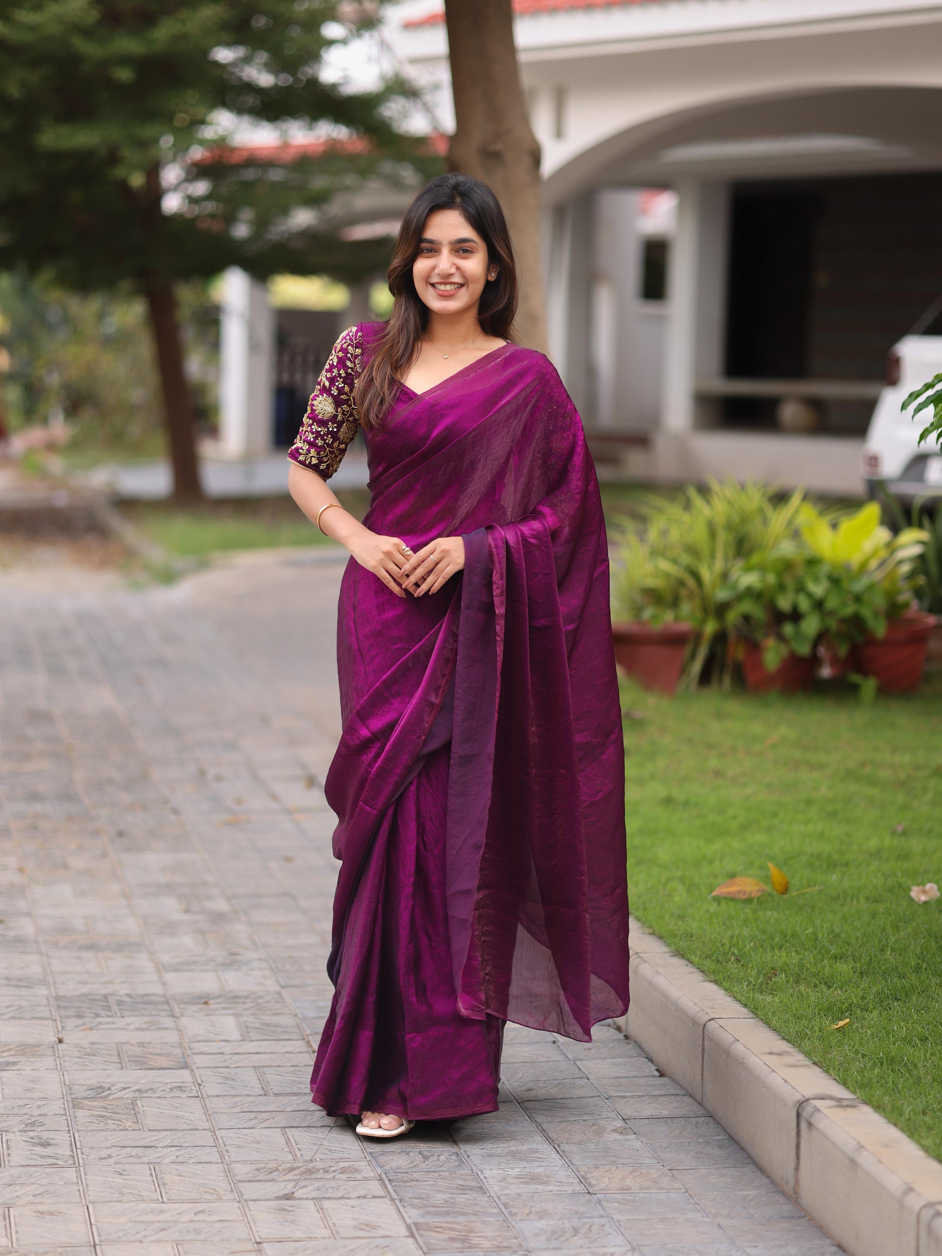 Shiny purple party wear with heavy work blouse saree
