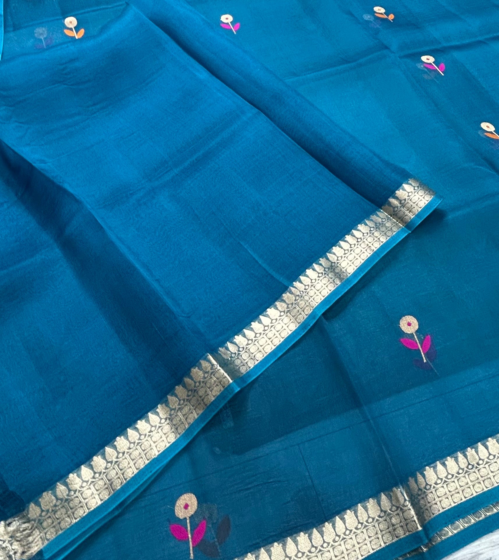 Peacock blue pure kora 105 organza silk saree