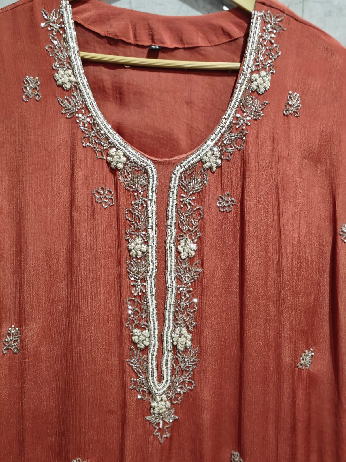 “Pari" Rustic Orange chinnon handwork party ware Kurtha set