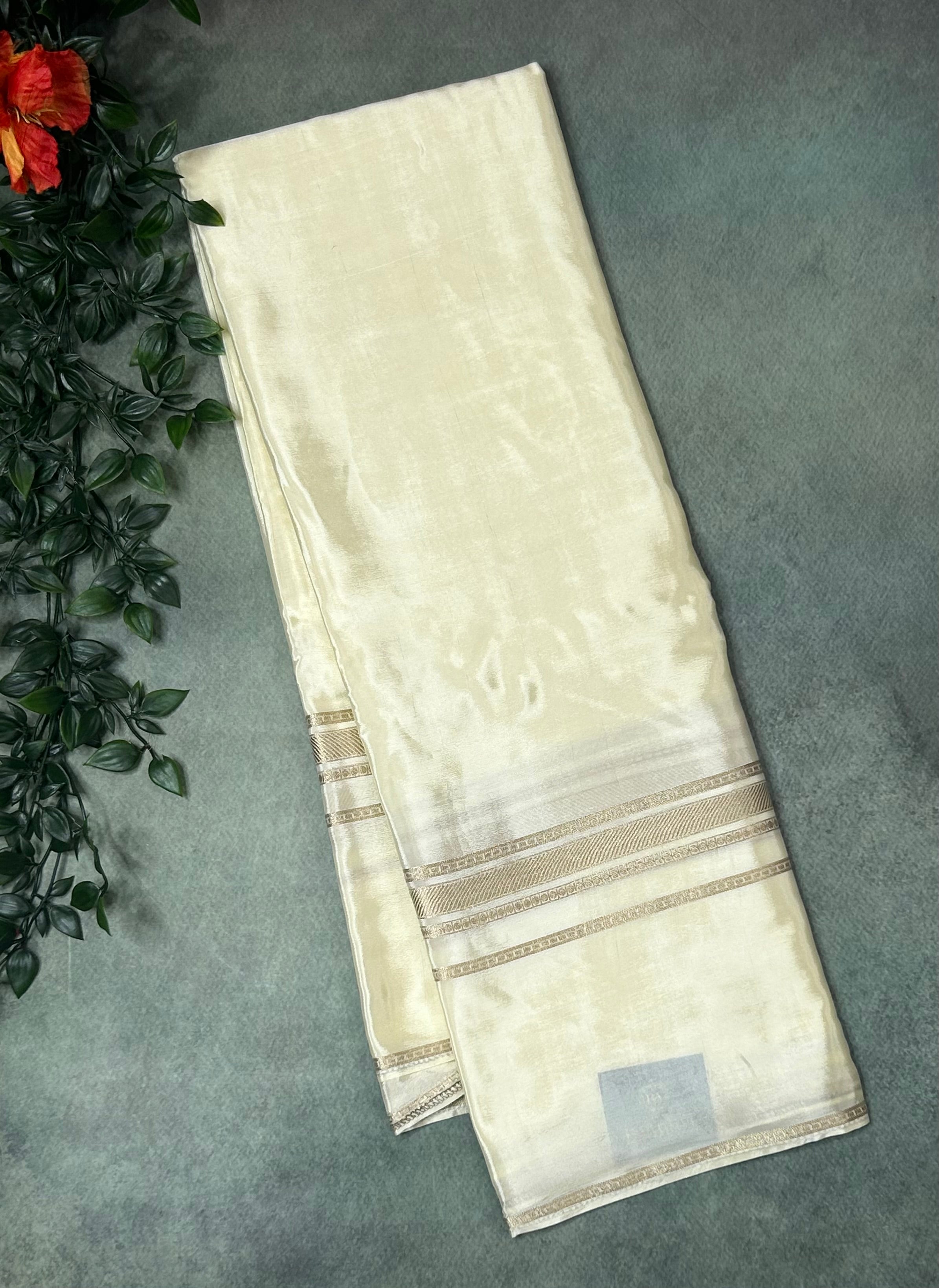 Cream plain four border semi mysore crepe saree