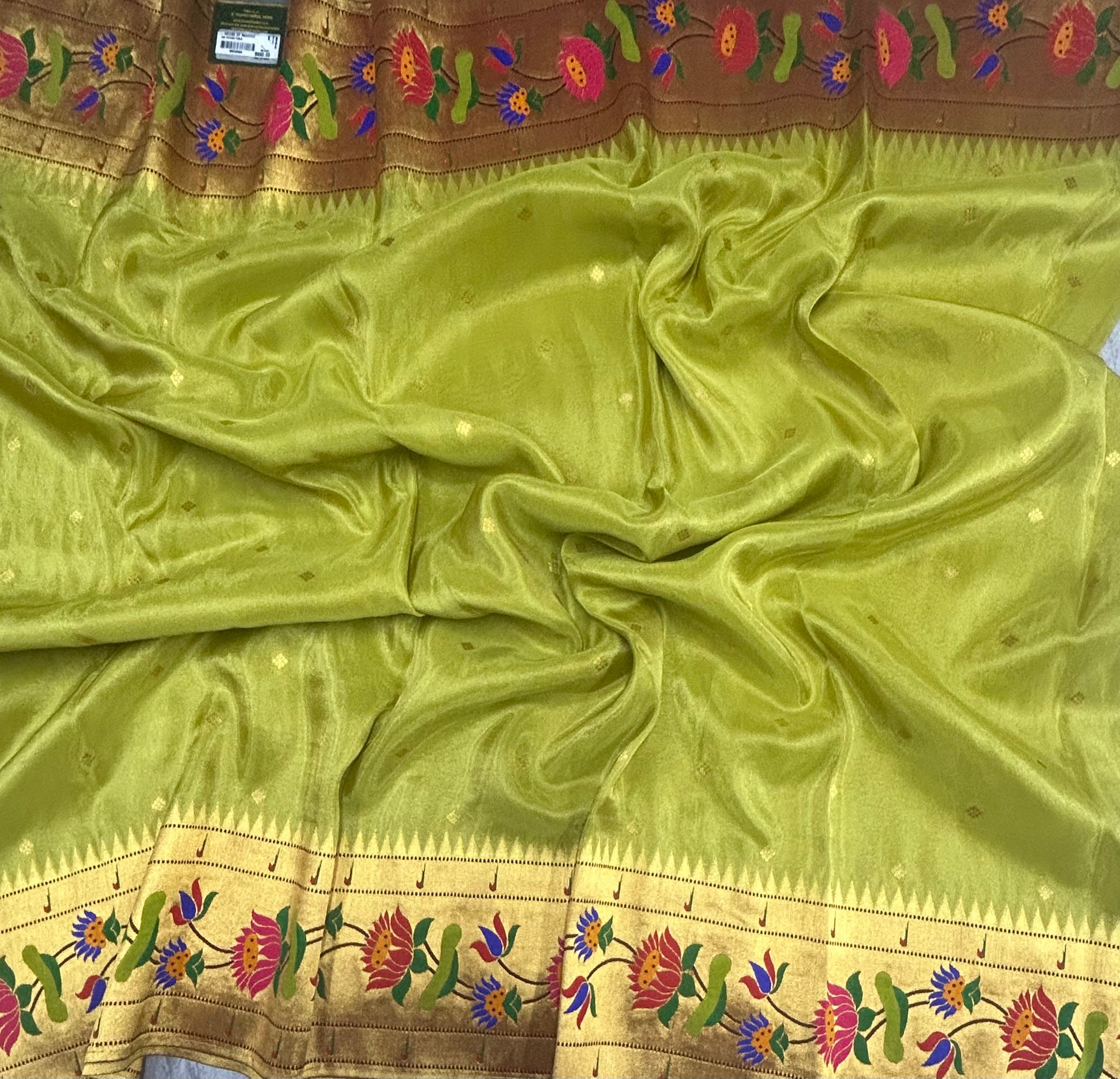Pastel green small butta tissue paithani border saree