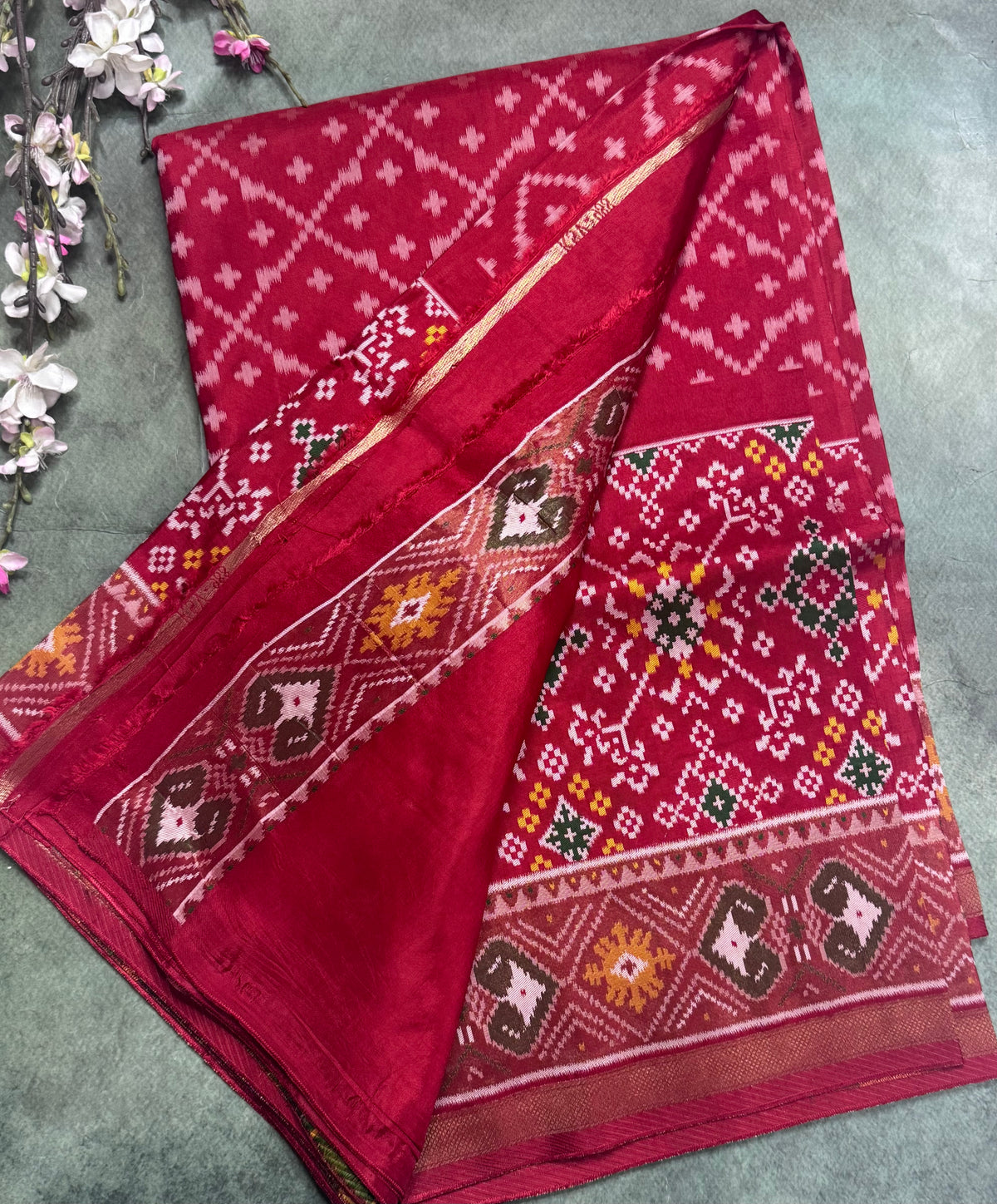 Red small border semi patola saree 111