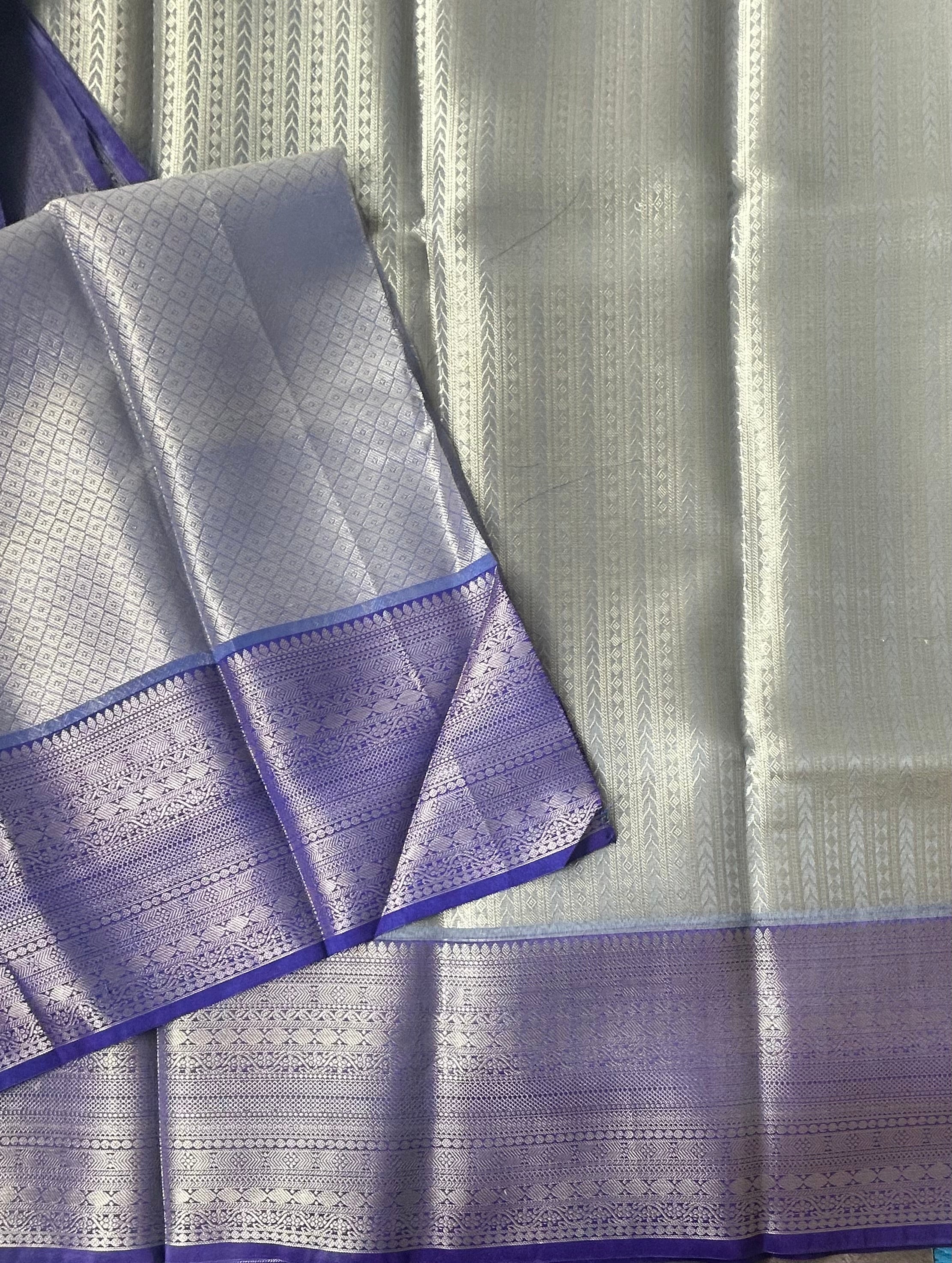 Pastel blue contrast border semi tissue saree