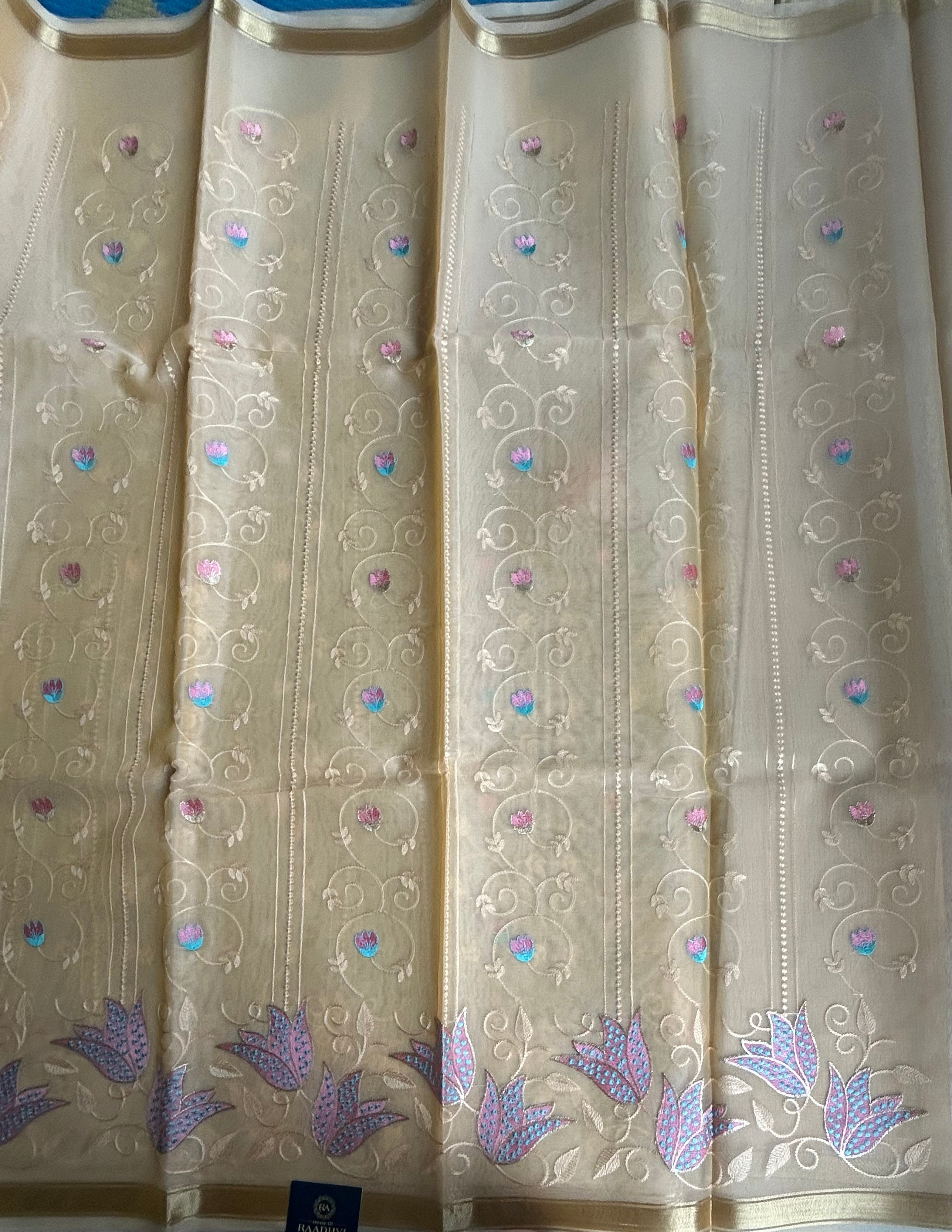 Peach embroidery semi tissue saree