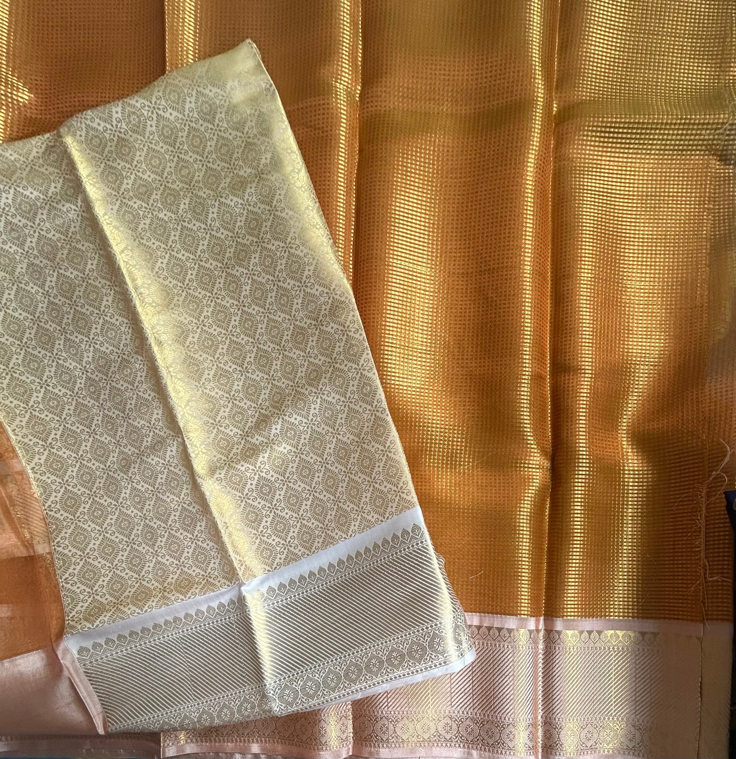 Orange brocade semi tissue saree