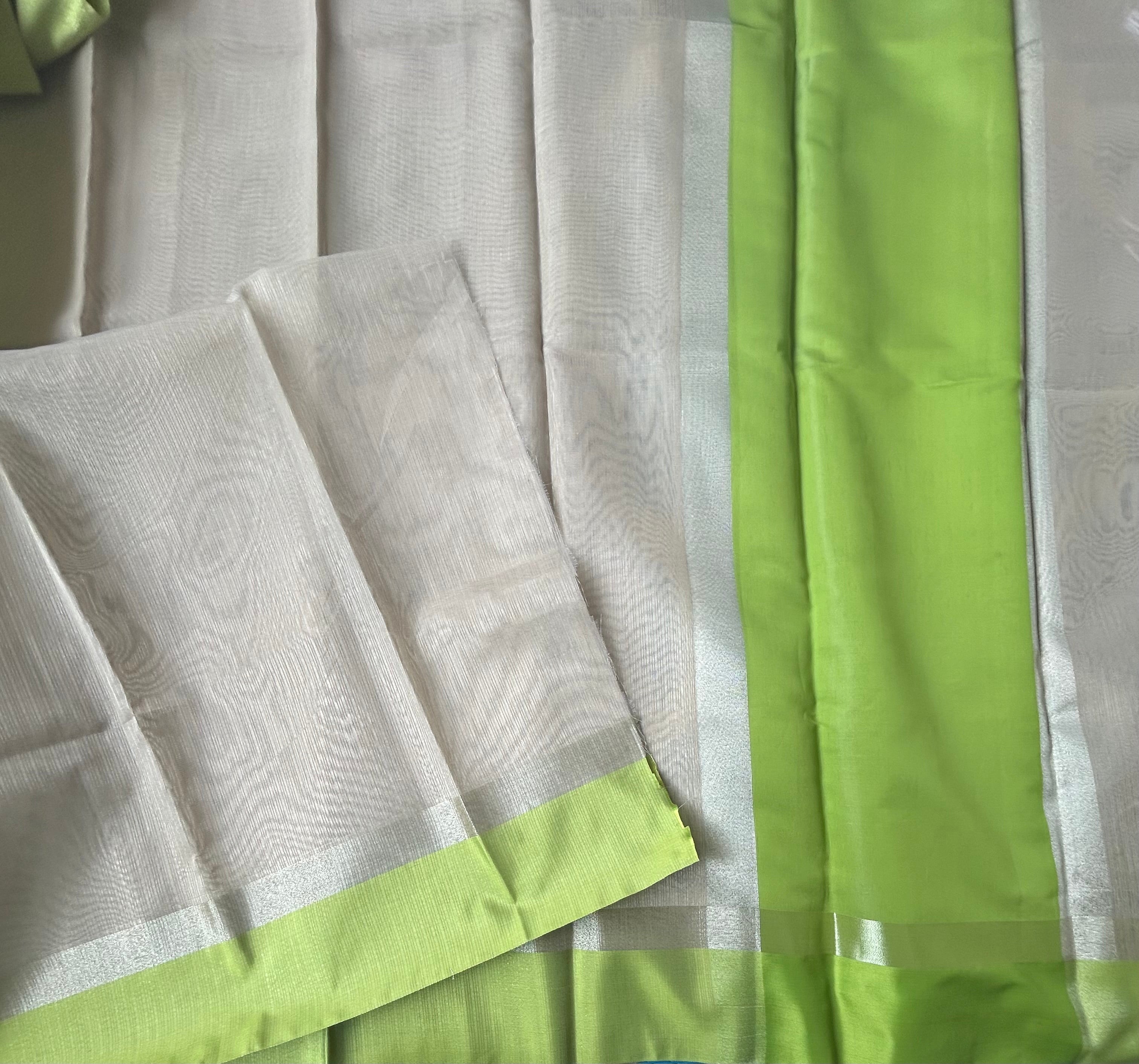 Ivory contrast border semi tissue saree