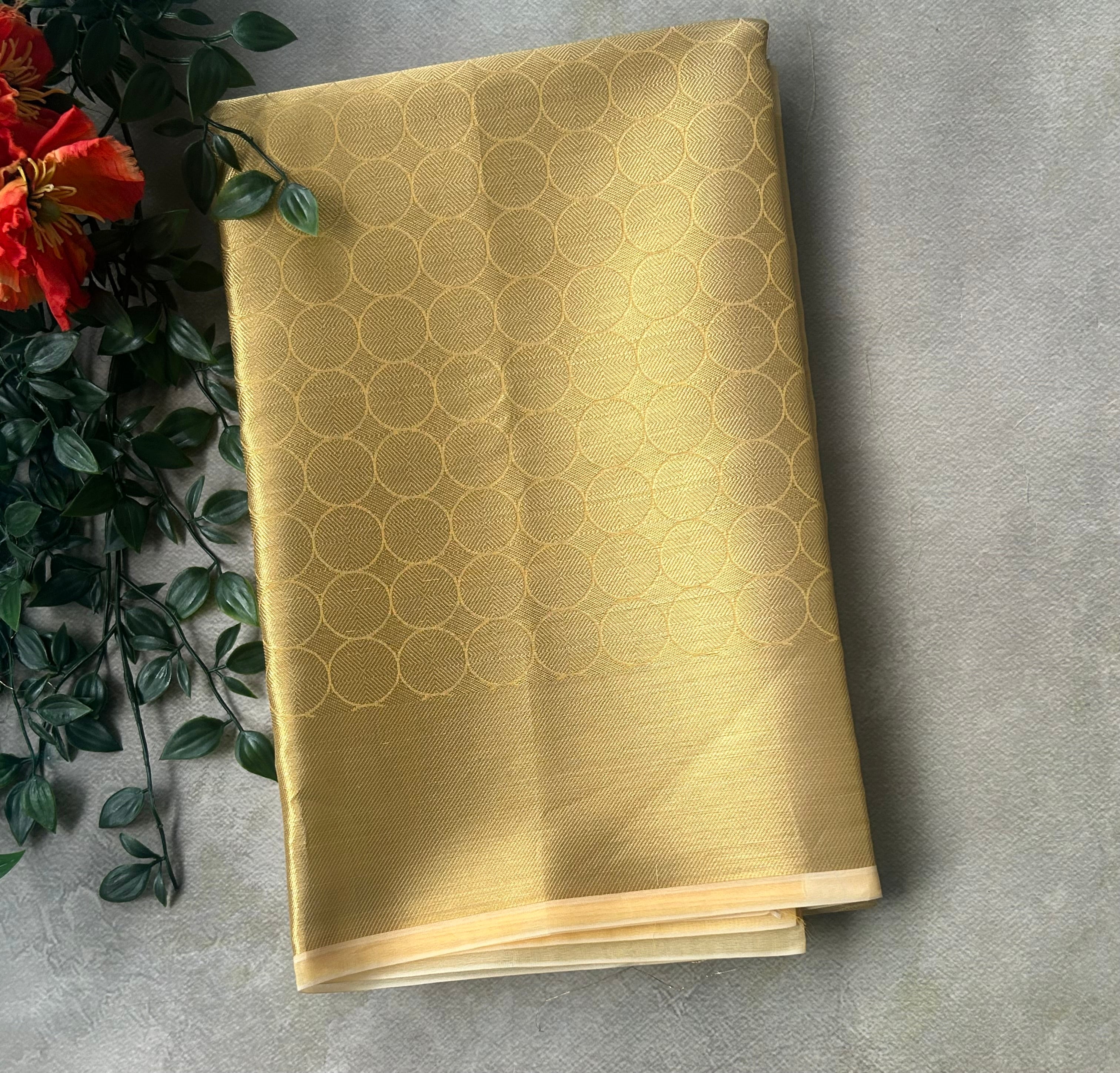 Golden brocade semi tissue saree
