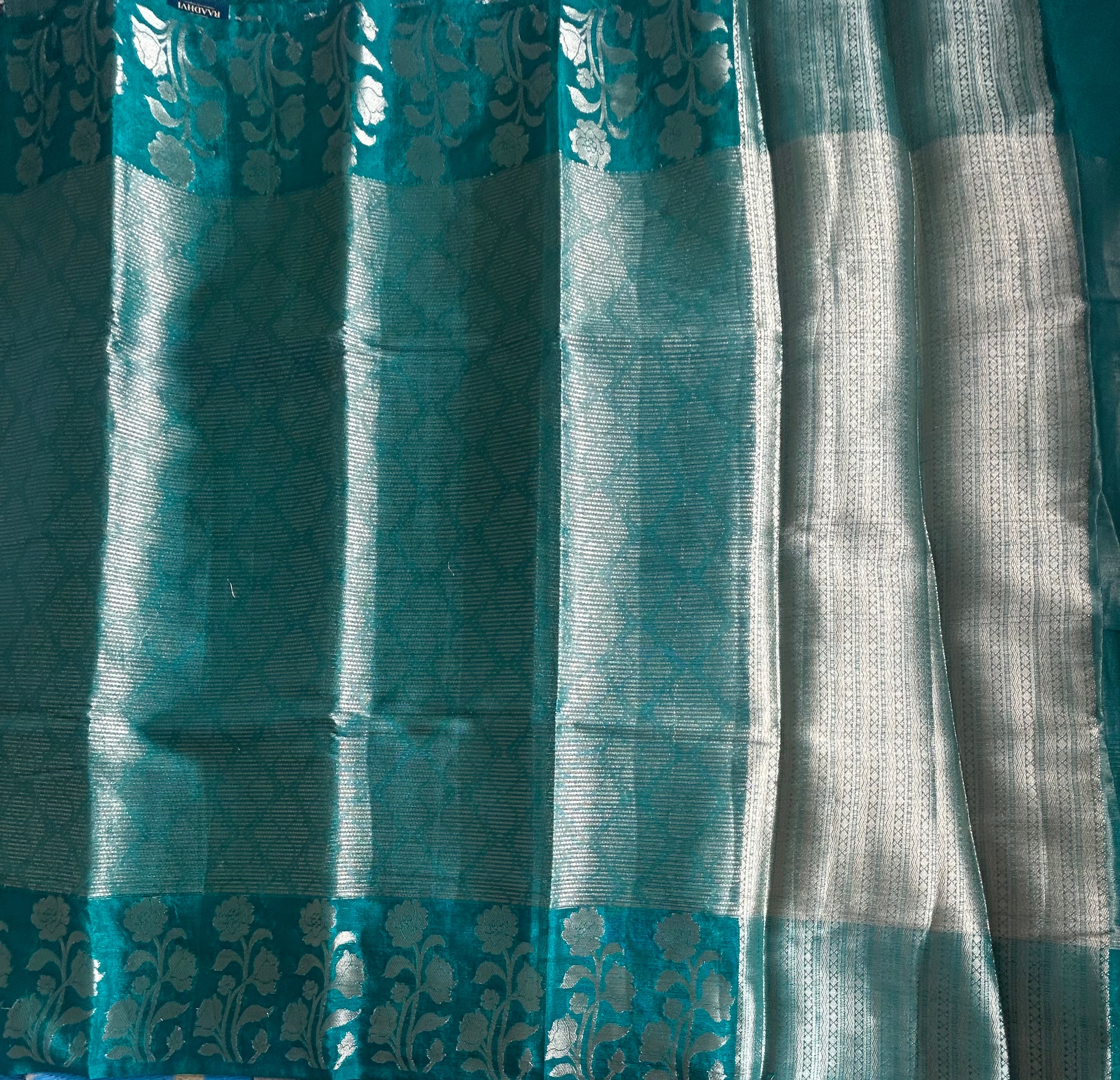 Rama green long border semi tissue saree
