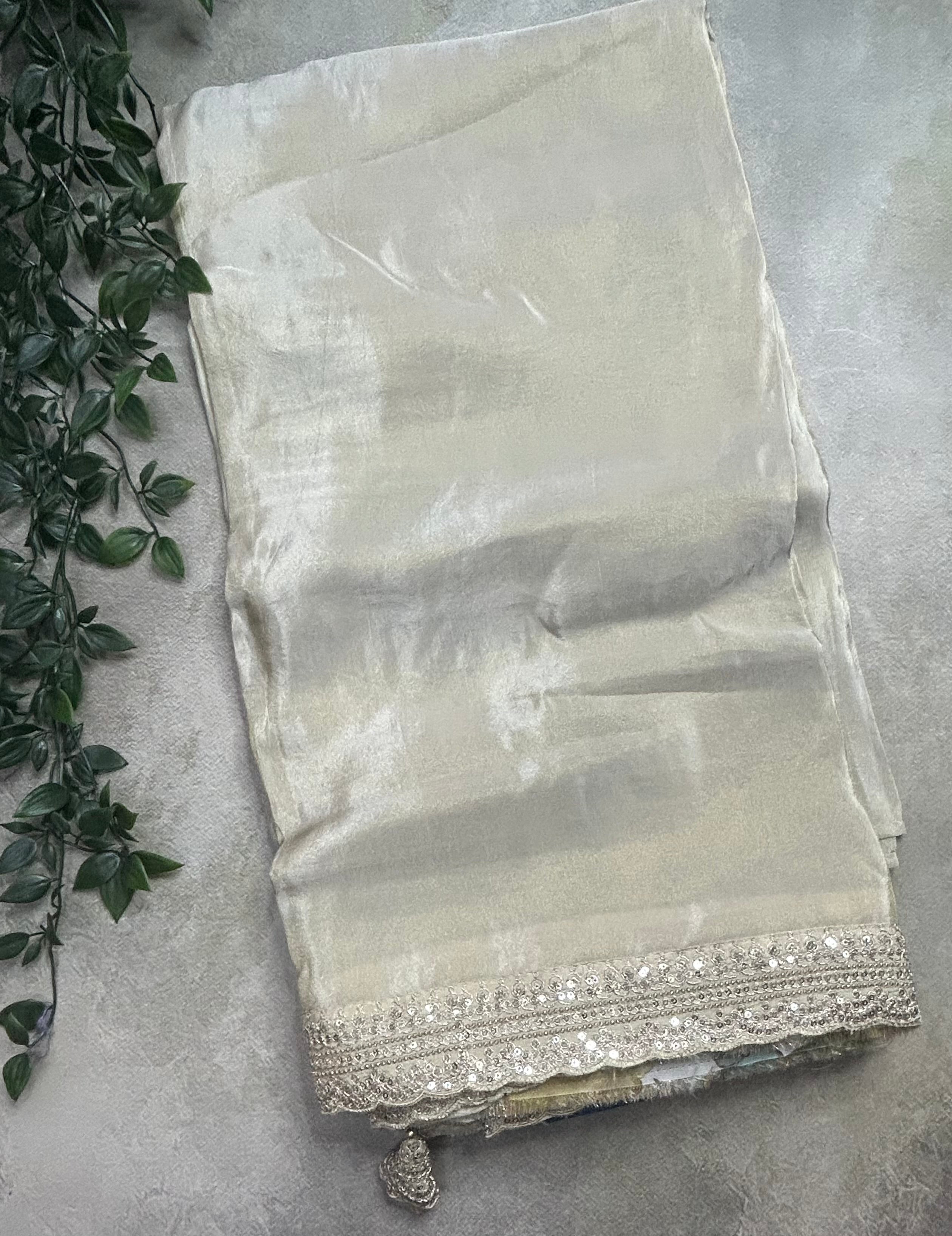 Cream plain tissue party wear scallop border saree