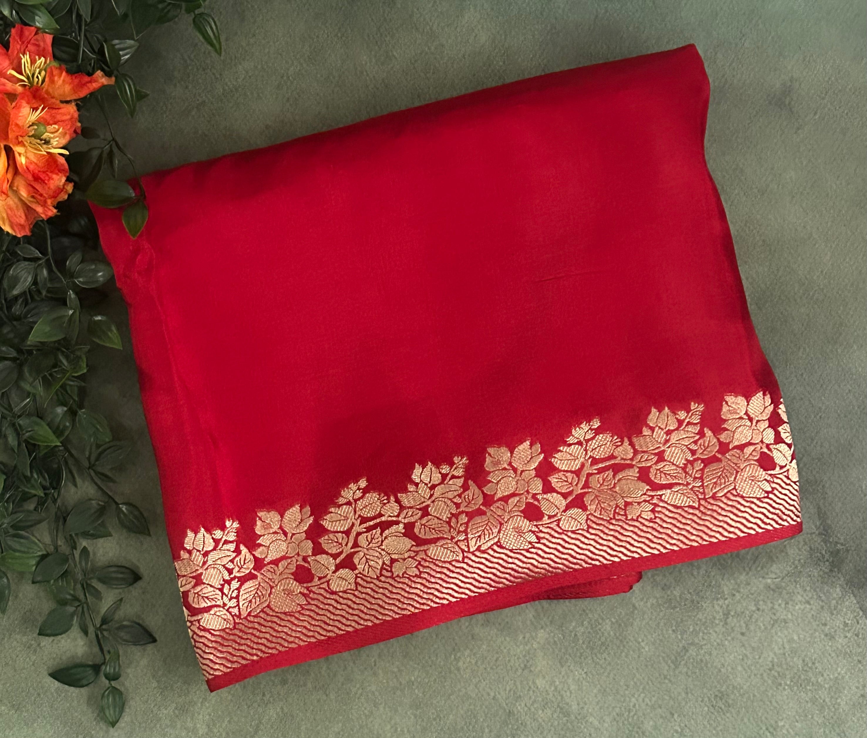 Red small border dola crepe 102 saree