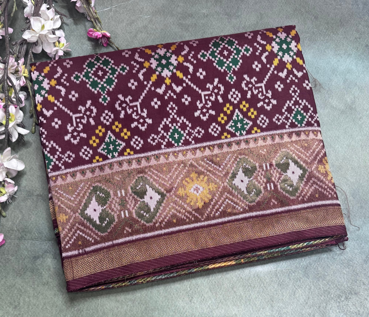 Brown small border semi patola saree 111