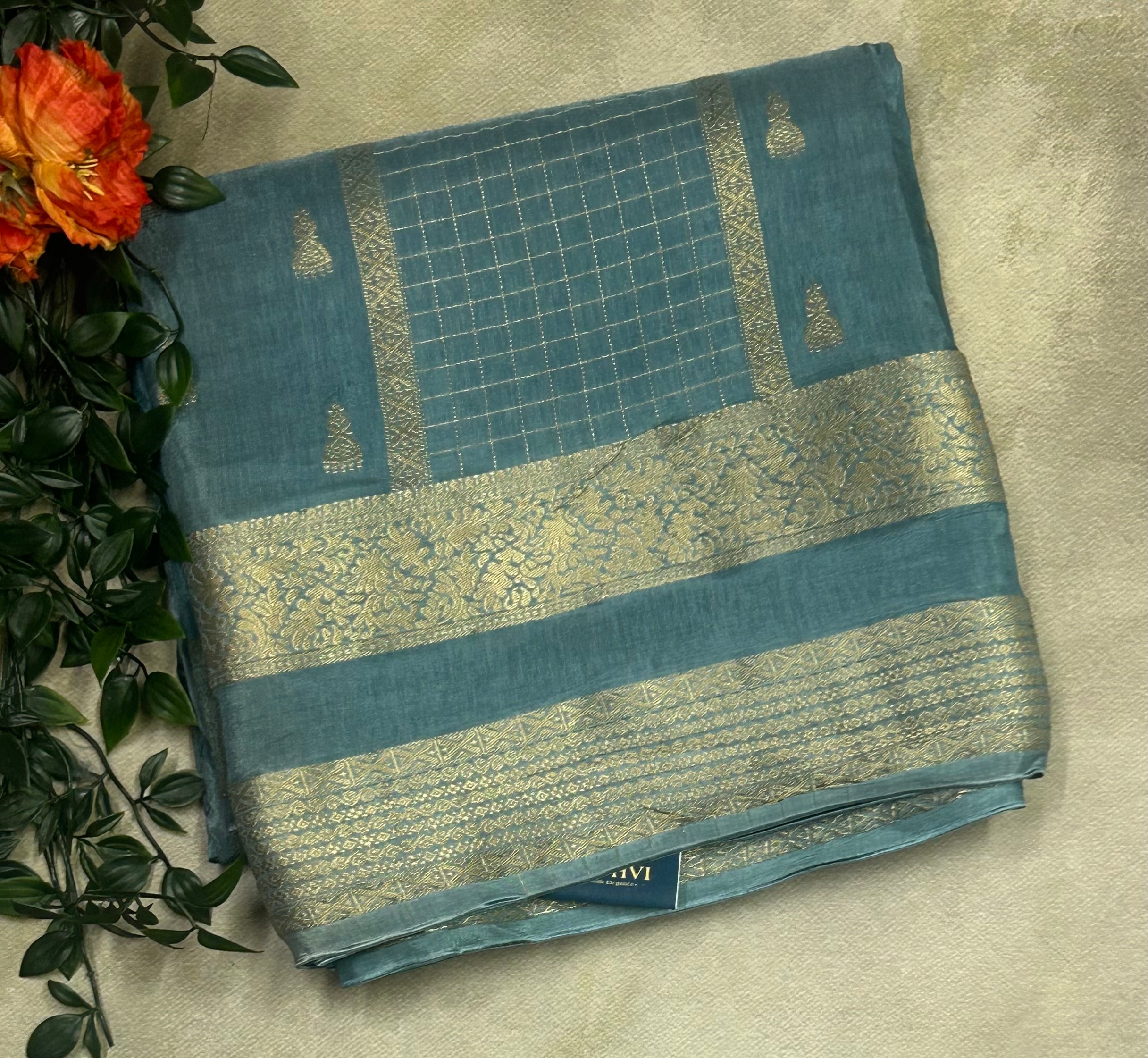 Light blue jumka n checks semi silk saree
