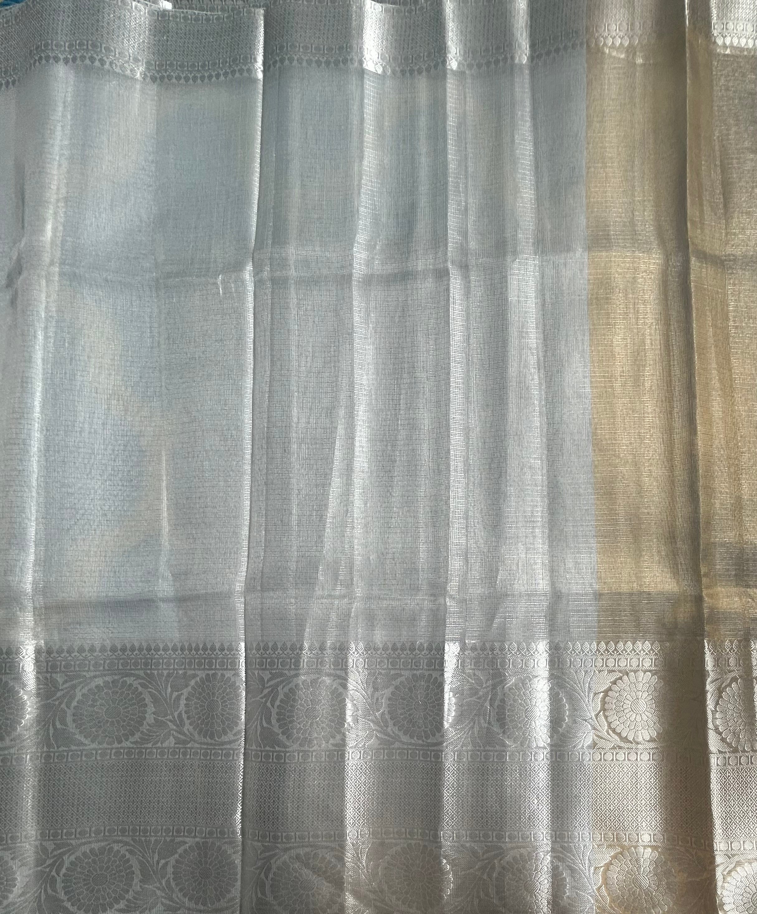 Silver long border semi tissue saree