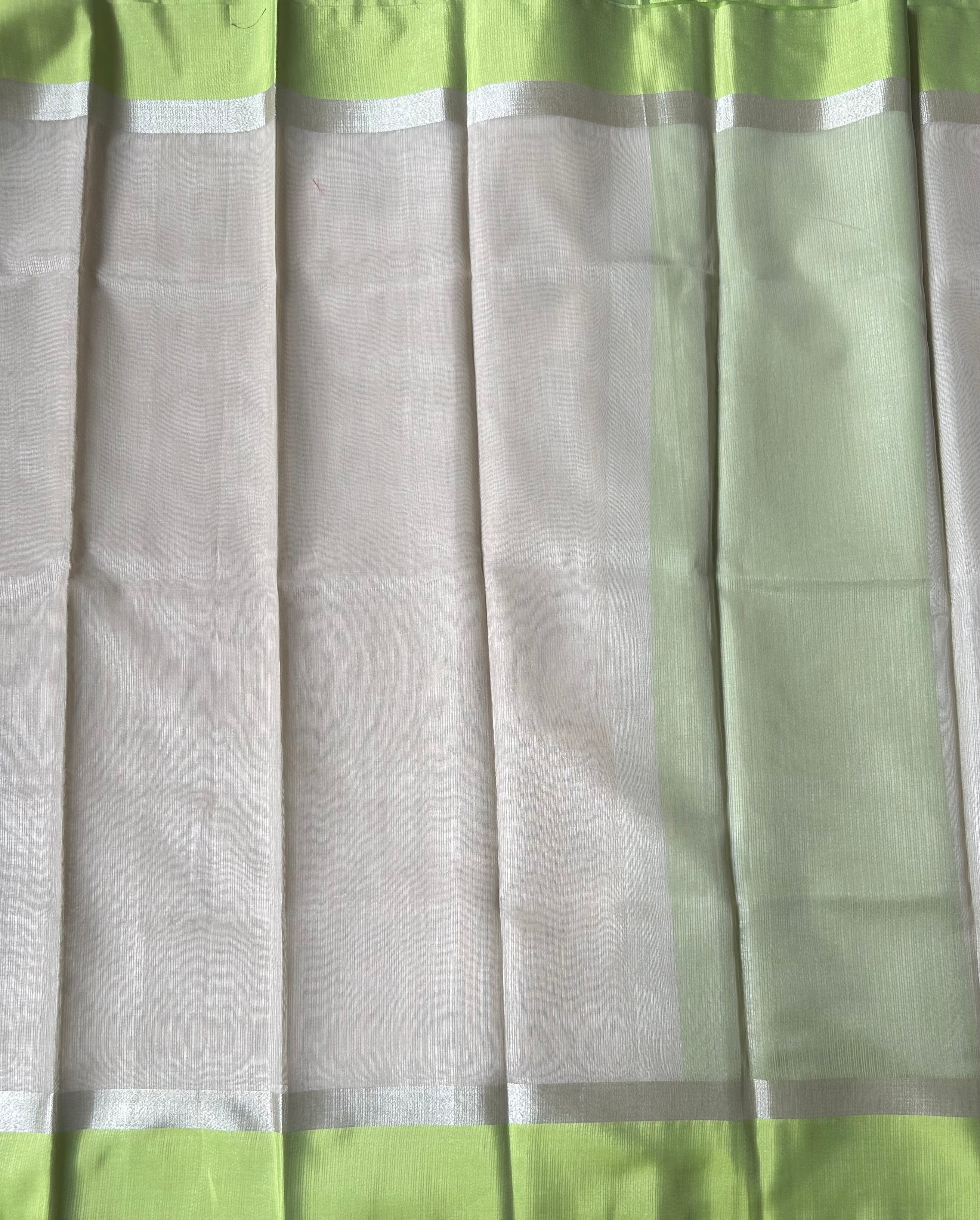 Ivory contrast border semi tissue saree