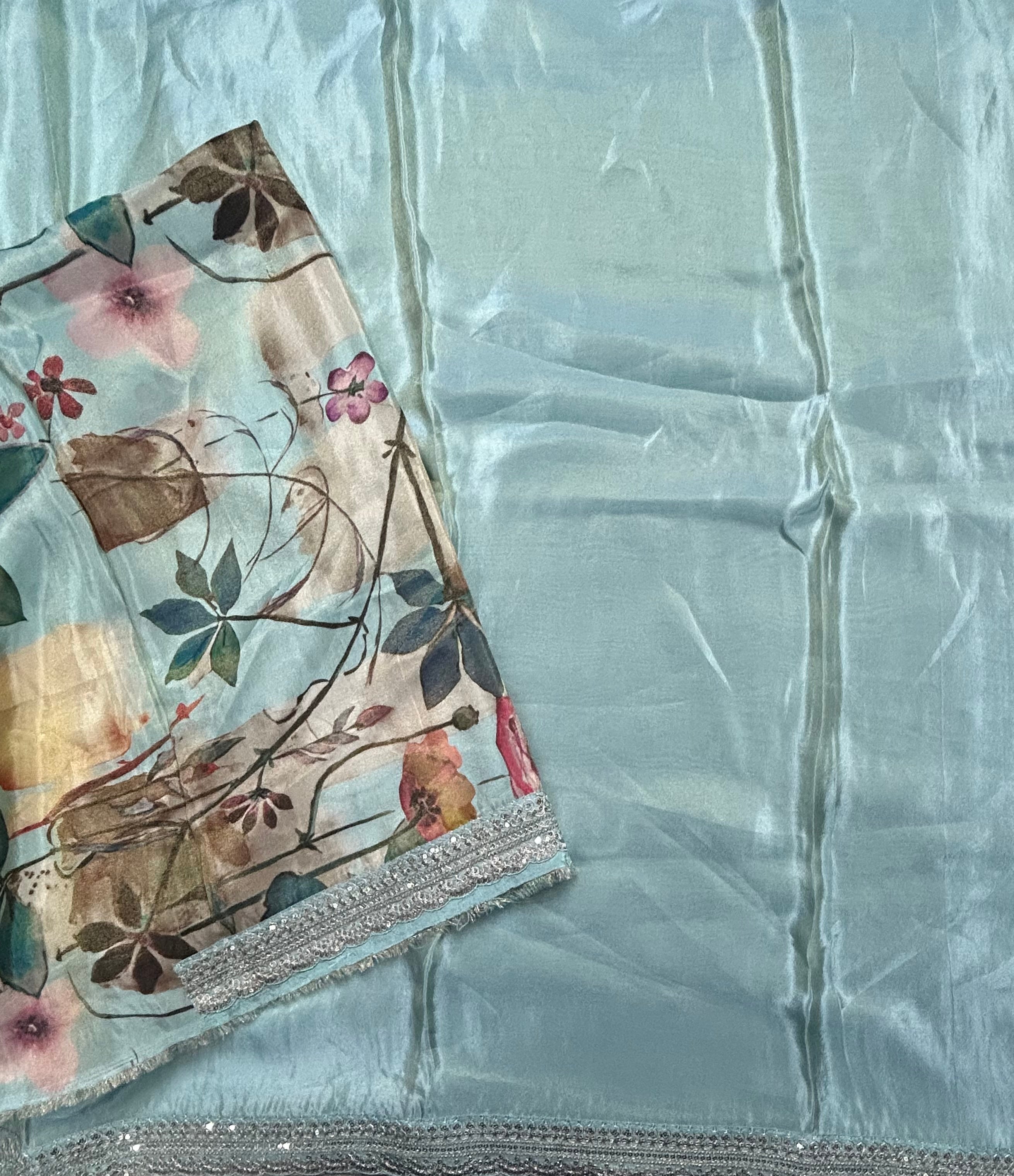 Pastel blue plain tissue party wear scallop border saree