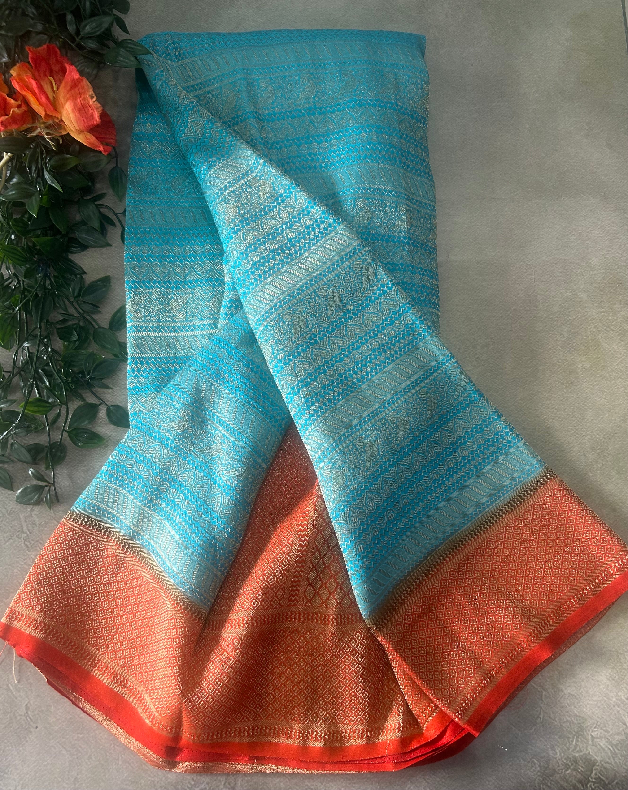 Sky blue brocade semi georgette 105 saree