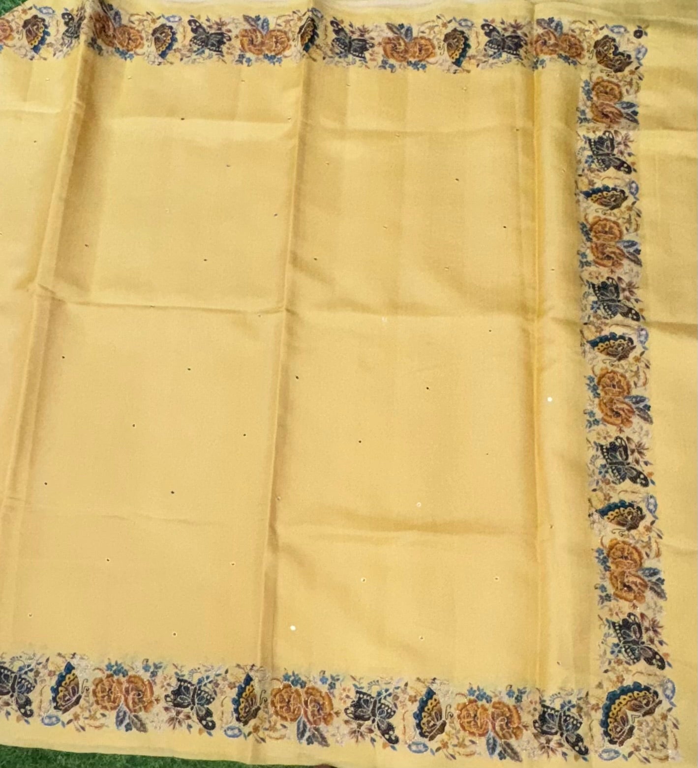 Light yellow printed border tussar saree