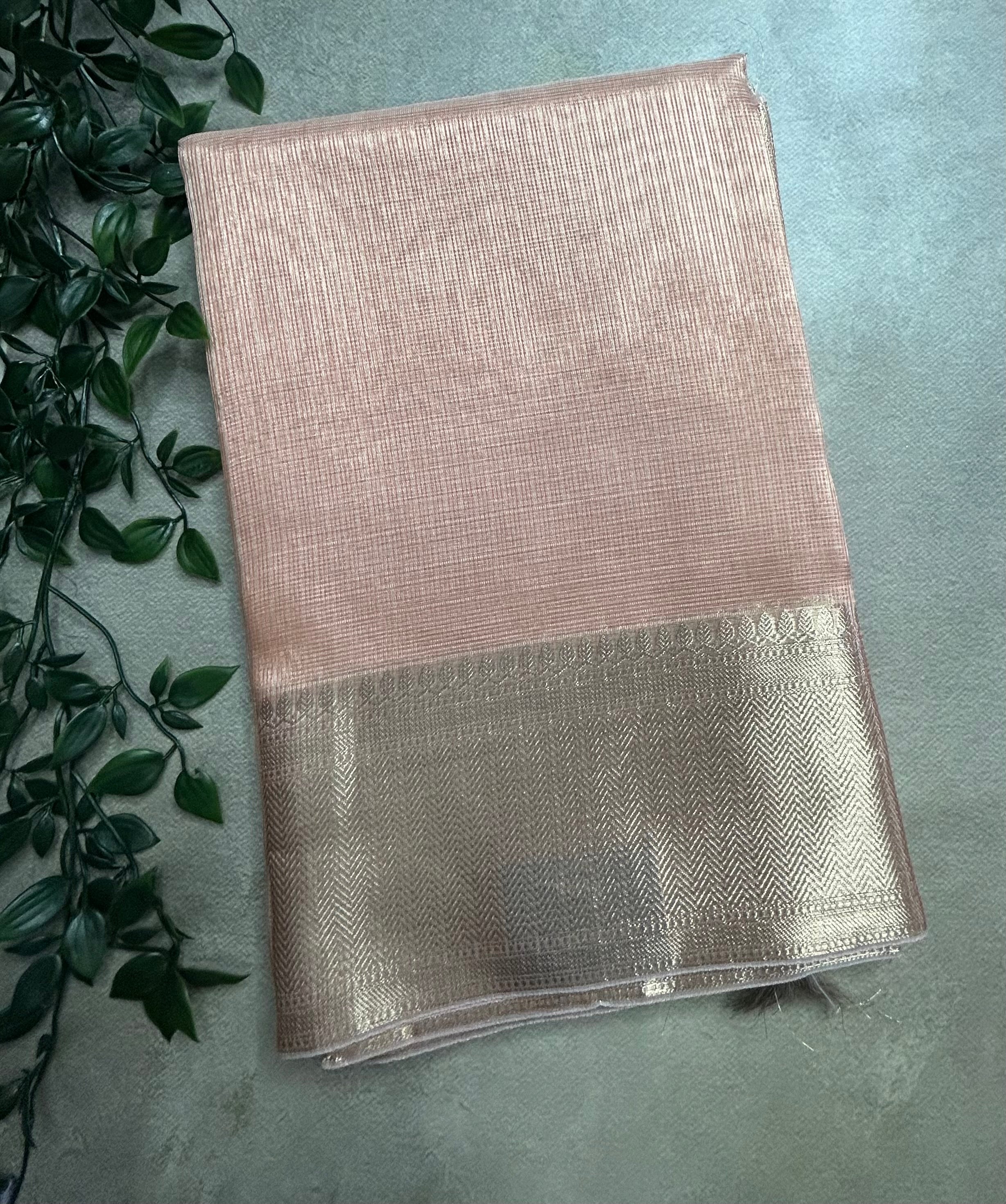 Peach self small checks semi tissue saree