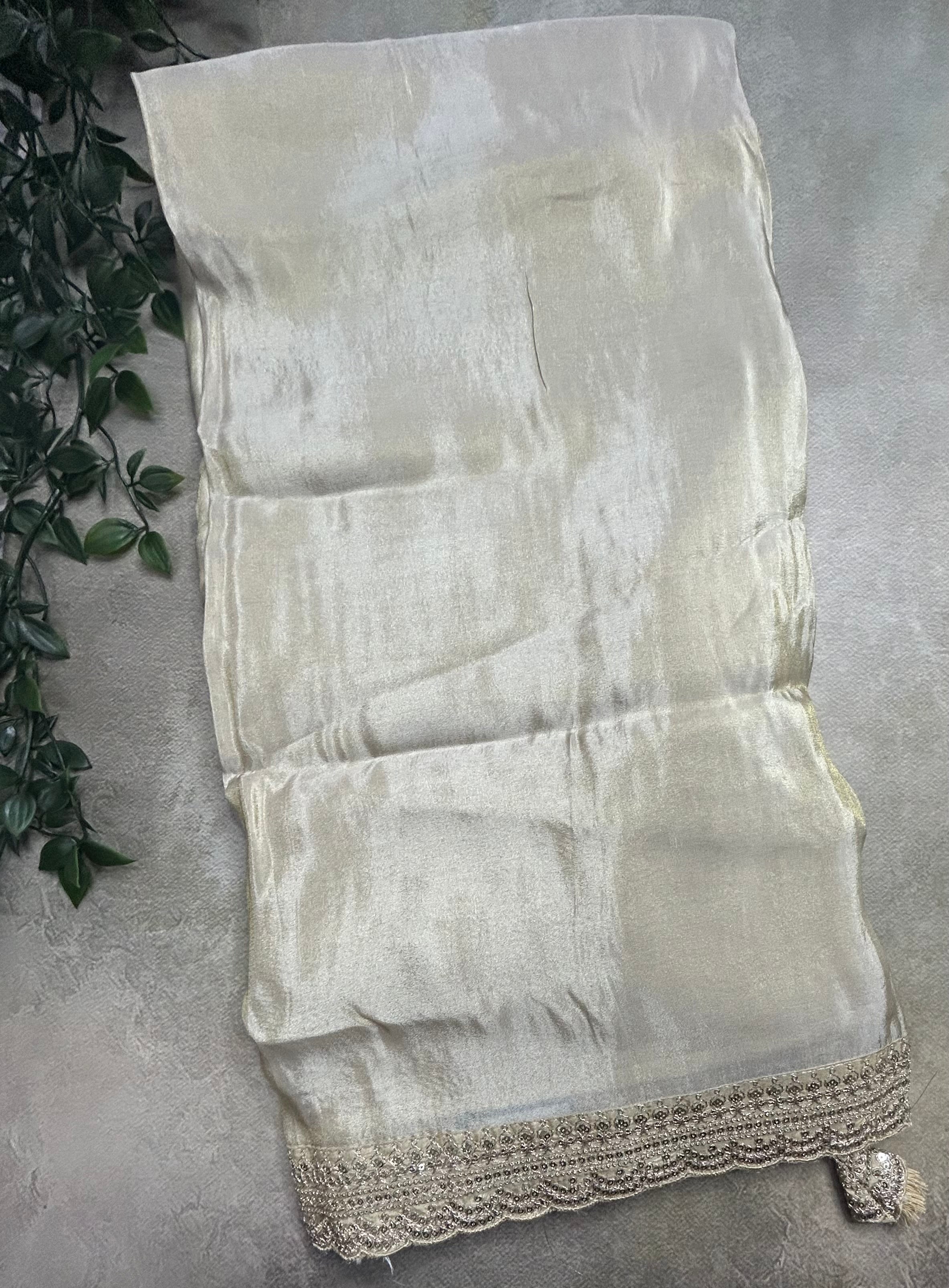 Cream plain tissue party wear scallop border saree