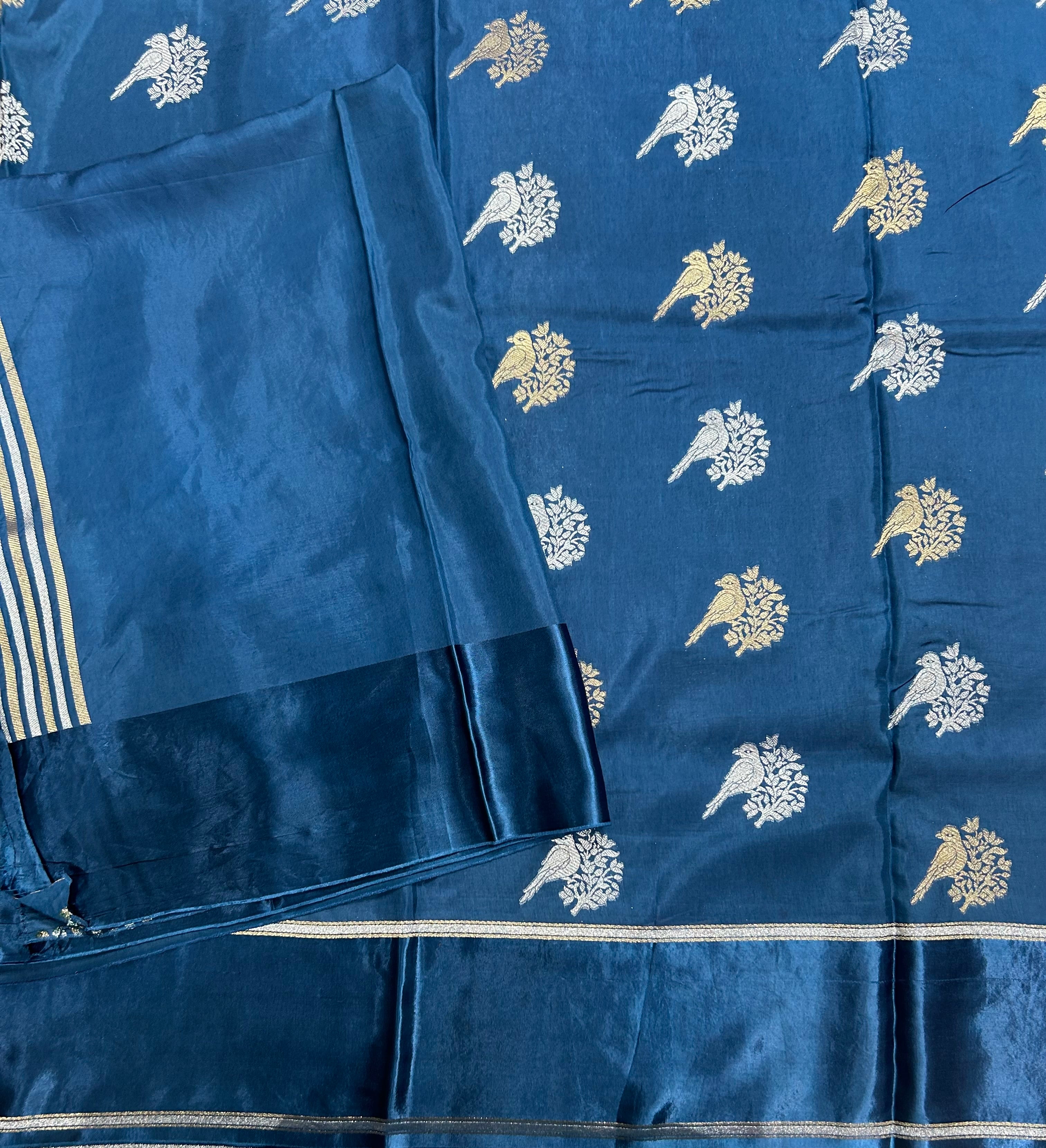 Peacock blue satin border dola crepe 105 saree