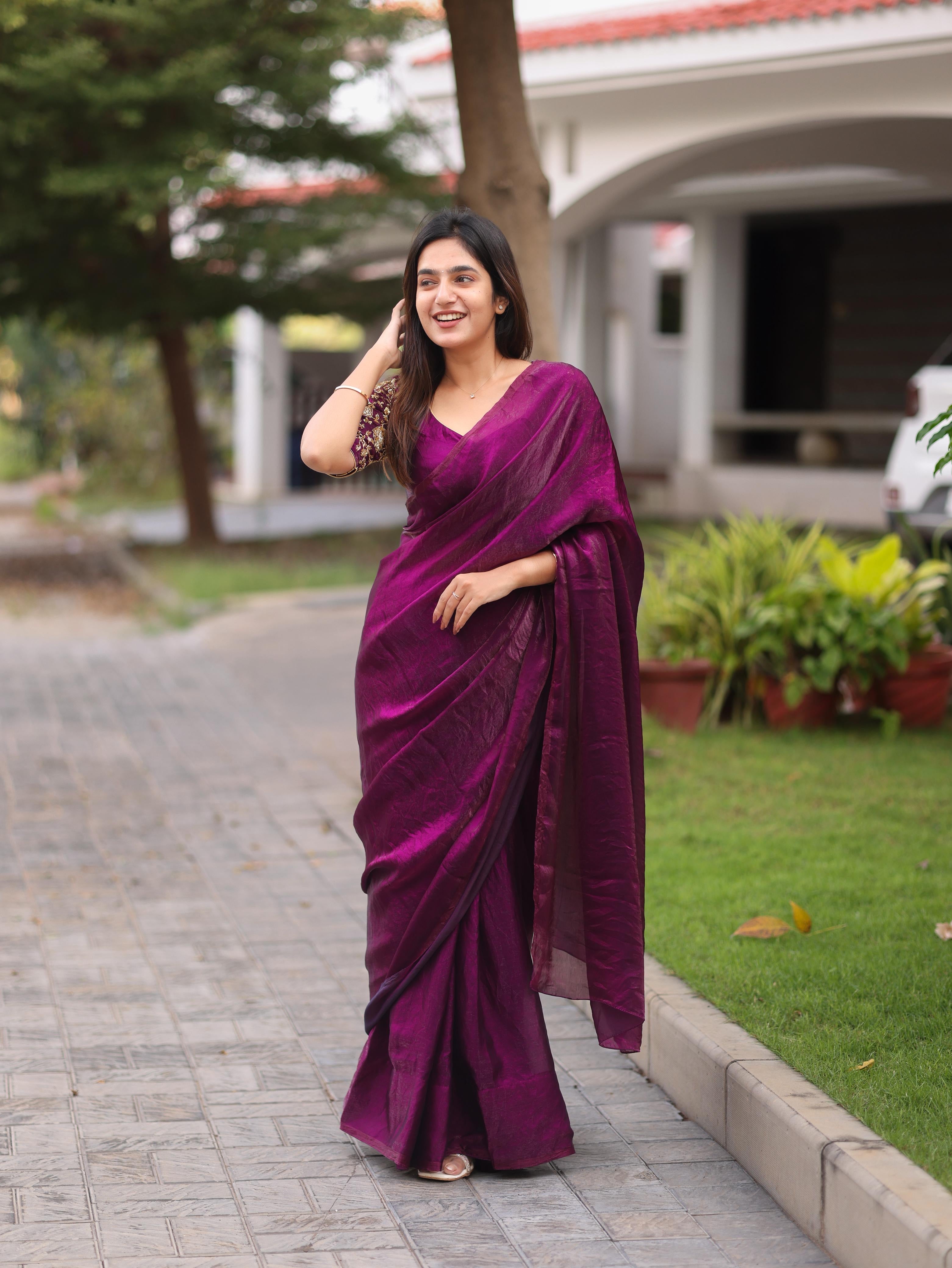 Shiny purple party wear with heavy work blouse saree